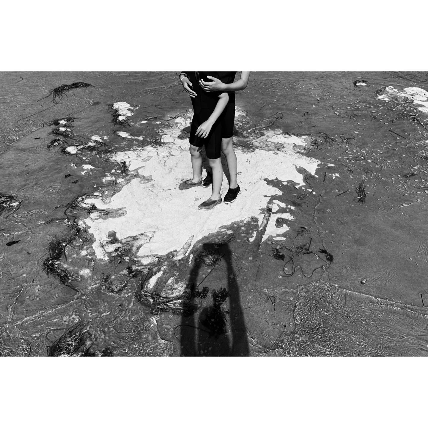 August 17, 2020. Sisters playing in the rising tide and disappearing islands at Rathtrevor Beach, eventually succumbing to the waves and collecting seaweed strands to offer to the Otter Gods instead. 
⁣
#iphonexmax 
#beautifulbc🇨🇦 
#covidsummer2020