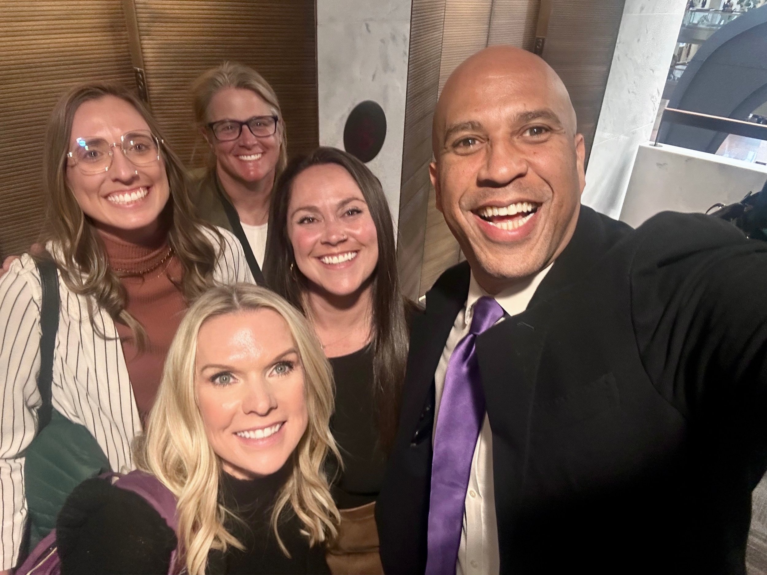   Paige Ross, Chris Lafferty, Natalie Boos, Leigh Gall, and U.S. Senator Cory Booker  