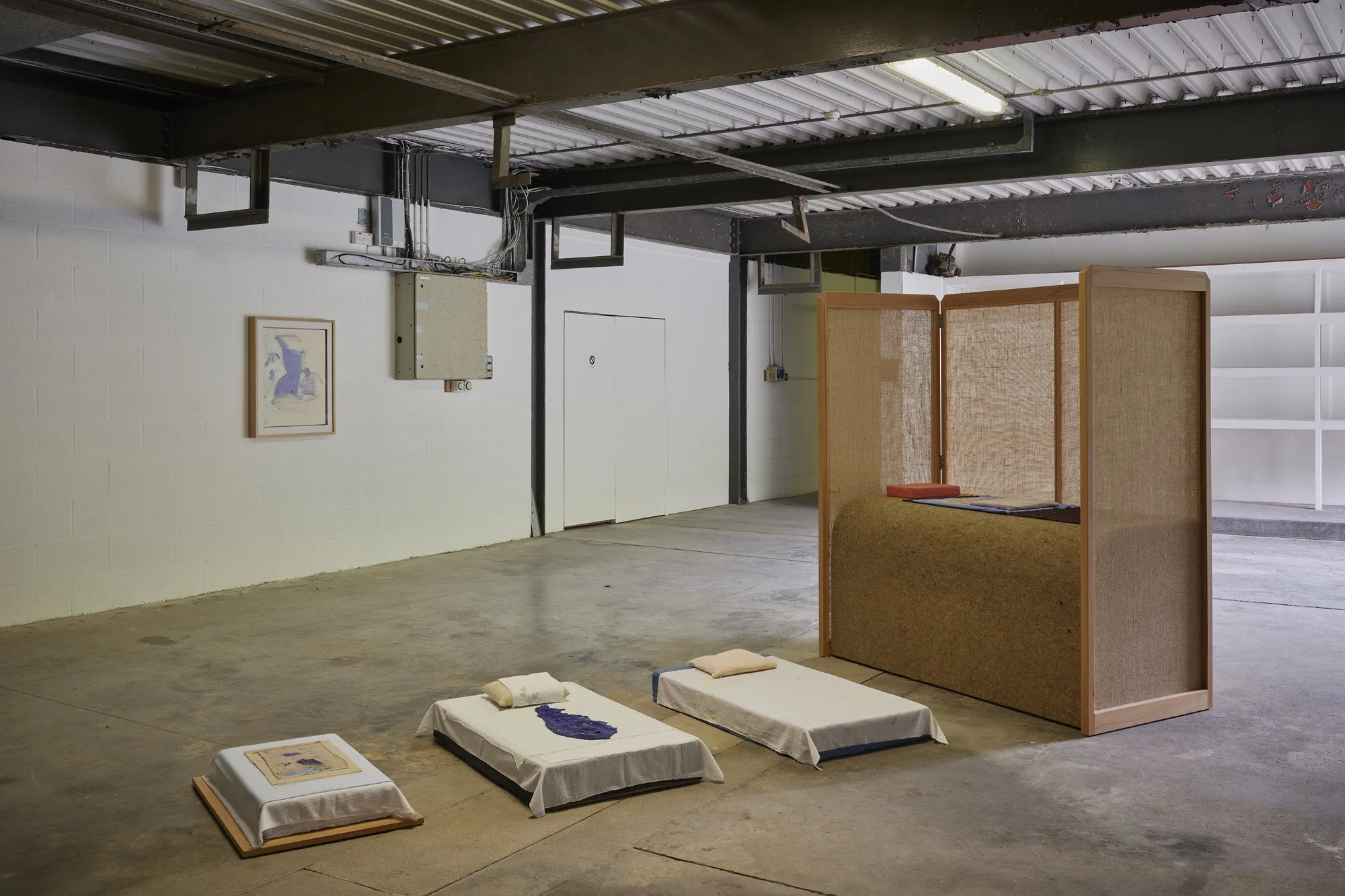   Aleana Egan ,  lit-clos , 2026. Beech frame, hessian, wool, linen, various dyed cotton and muslin fabrics, latex, pigment, shell, foam, copper (four parts), 180 x 160 x 390 cm. Installation view, Interface, Inagh. Courtesy of the artist and Kerlin 