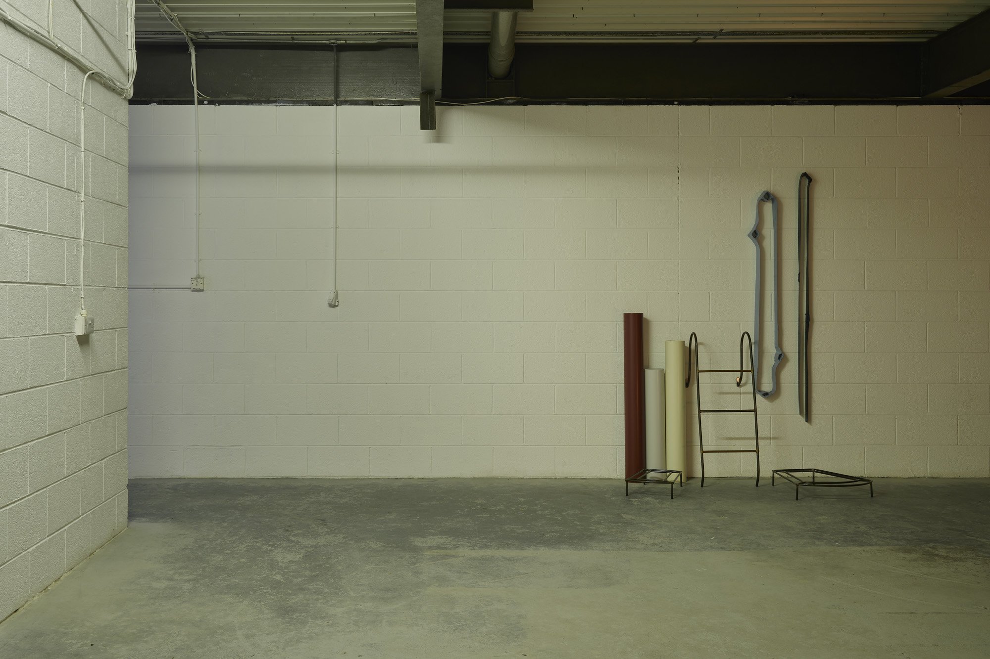   Aleana Egan ,  a social edge , 2015. Laquered steel and copper, powder coated steel pipes, card, tape, filler, paint, varnish, 220 x 140 x 86 cm. Installation view, Interface, Inagh. Courtesy of the artist and Konrad Fischer Galerie. Photograph by 