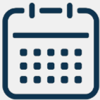 Icon of a calendar with a grid of dates.