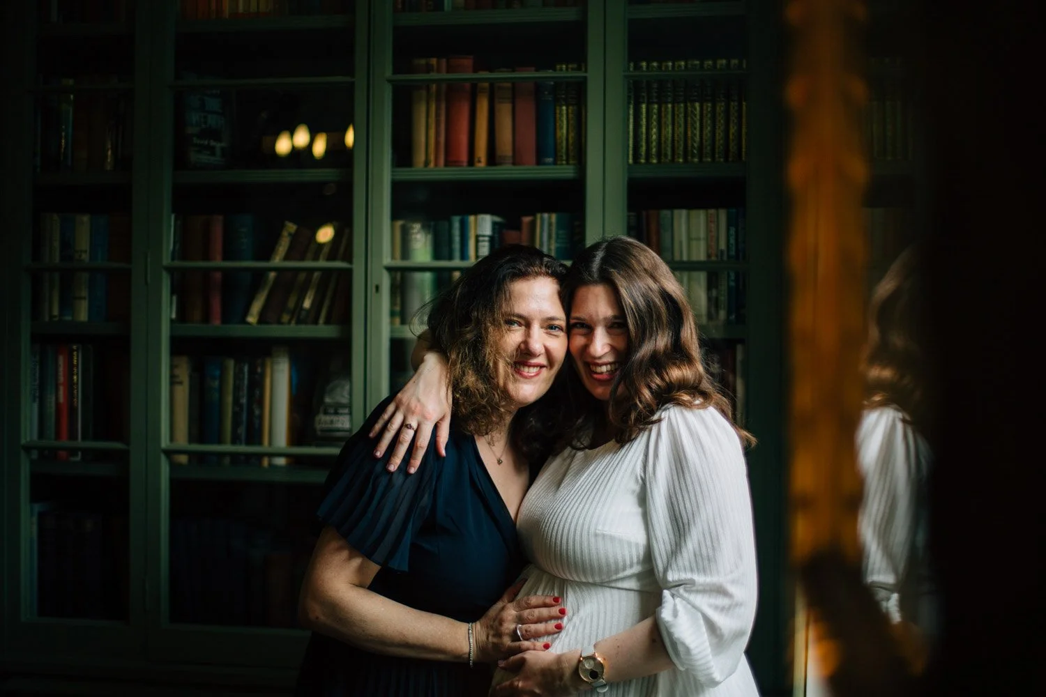 Newly married couple embracing inside Burgh House in Hampstead