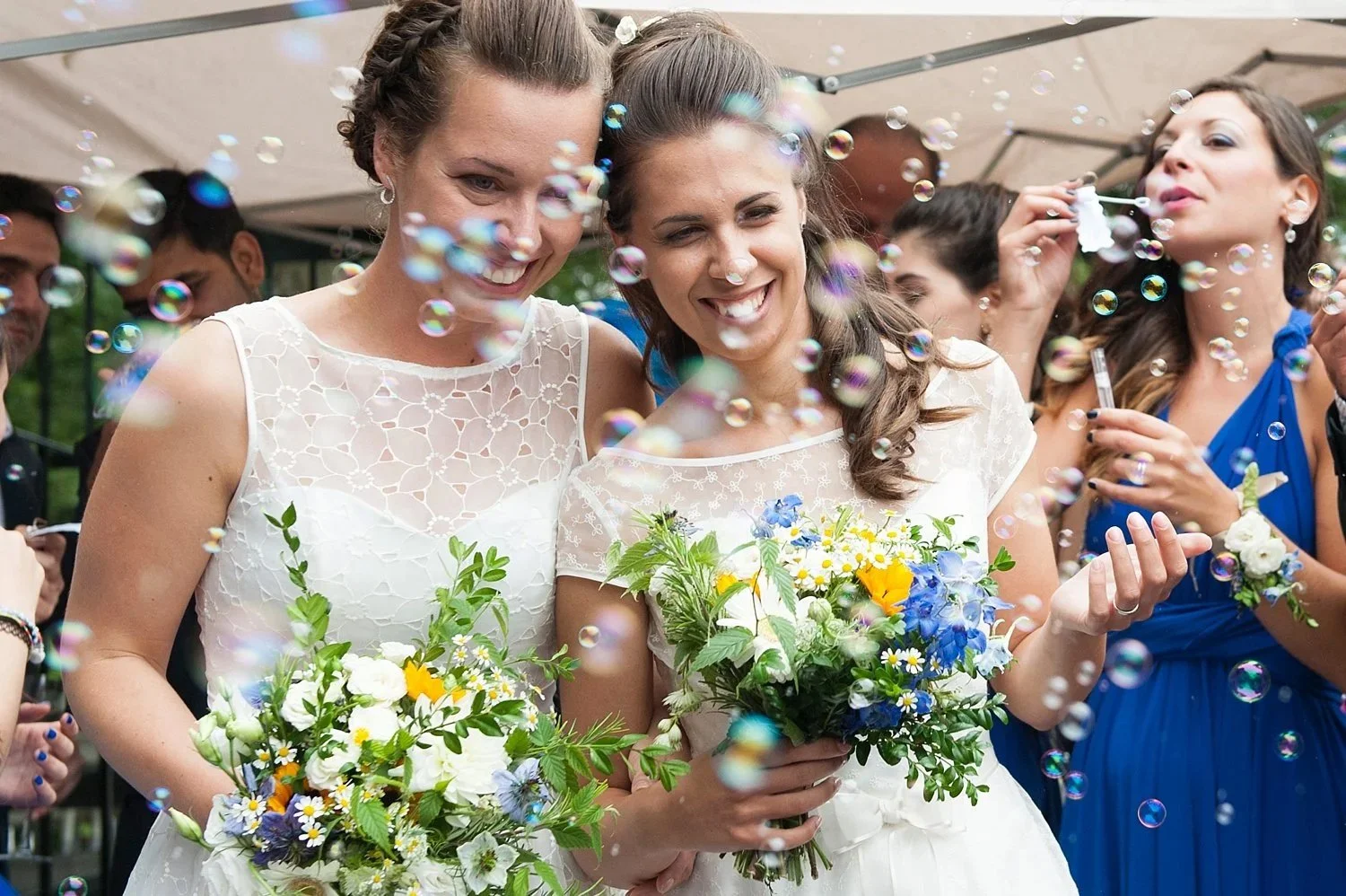 Two brides celebrating their LGBTQ+ wedding
