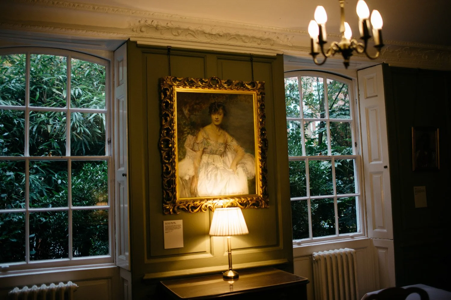 Historic interior of Burgh House in Hampstead with large windows and artwork