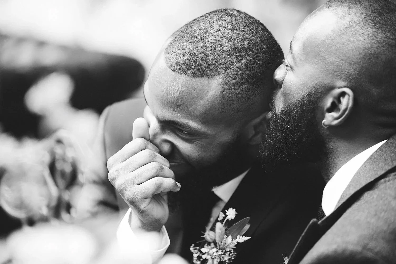 Gay wedding couple sharing an emotional moment