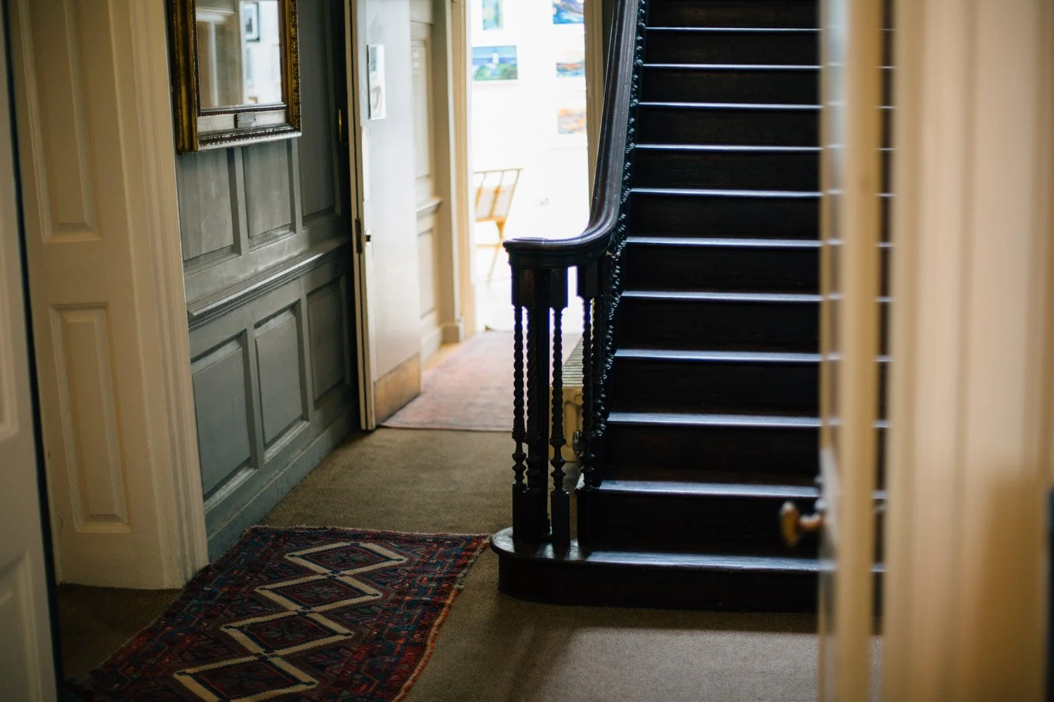 Historic staircase and wood-panelled interior at Burgh House in Hampstead