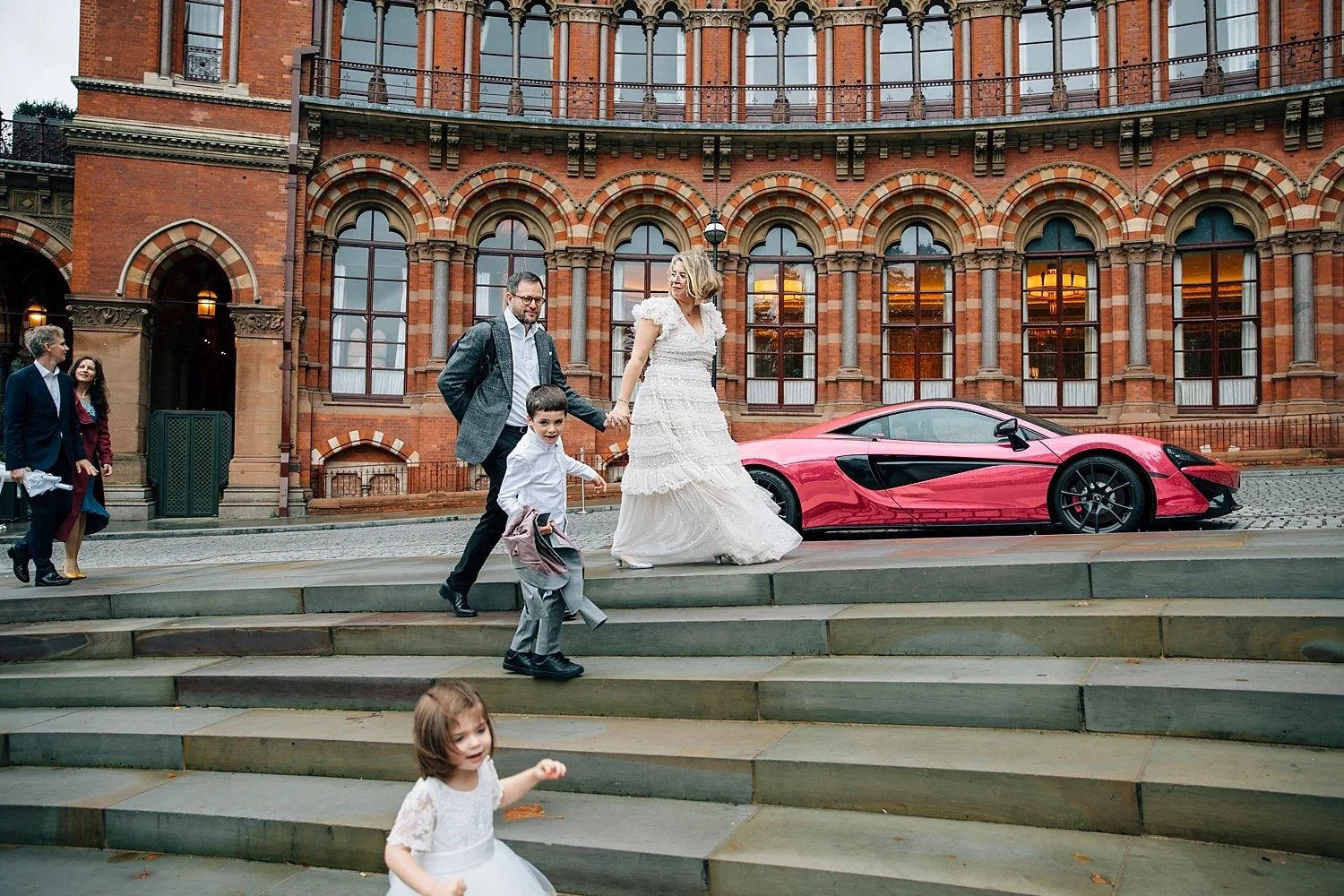 Bride and daughter outside St Pancras Renaissance Hotel after their Camden Town Hall wedding