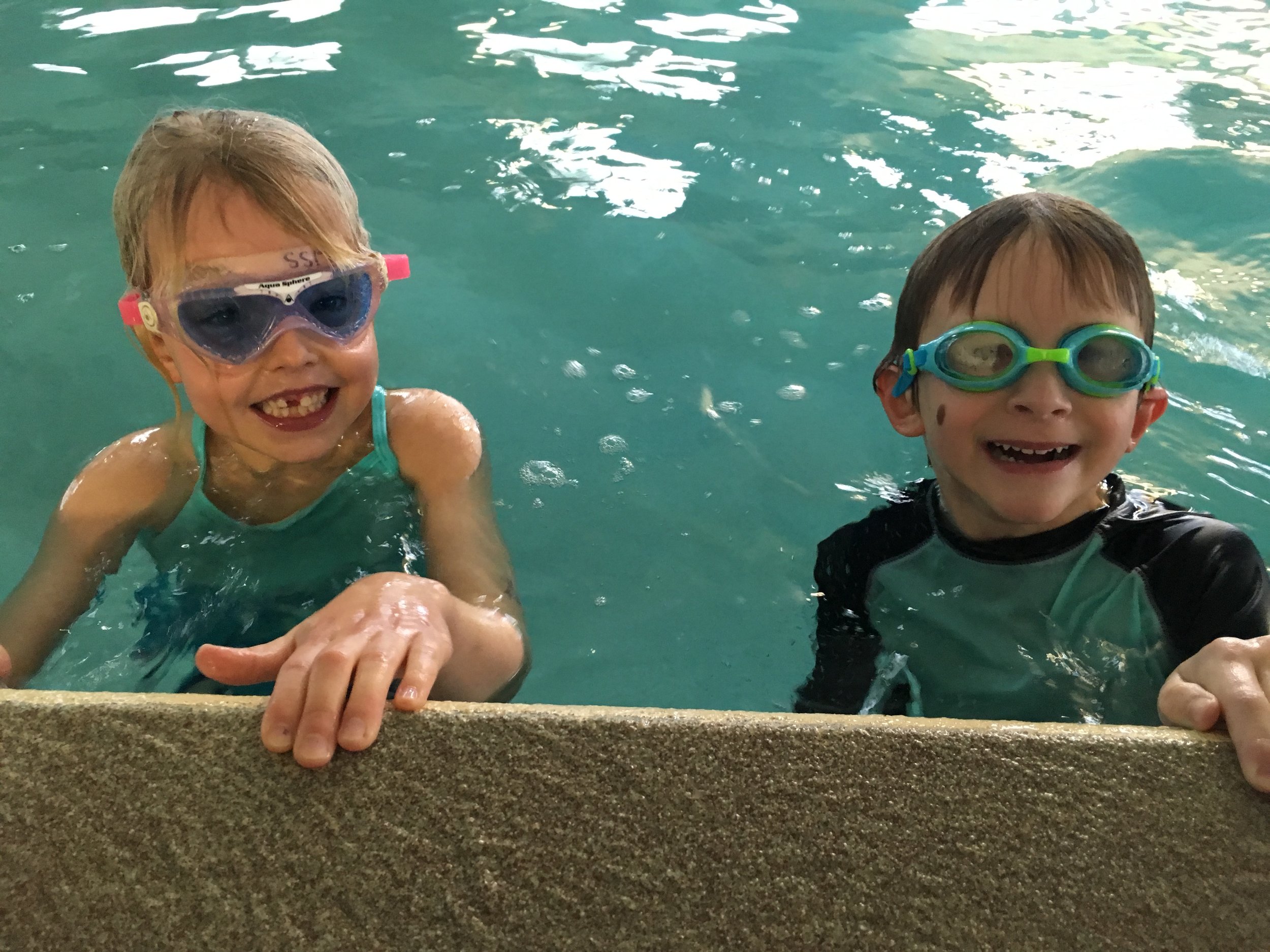  These two lower elementary students are enjoying their swim lessons after walking to the pool from school as part of their winter fitness program. 