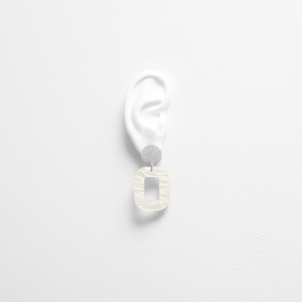 white-baby-rosa-earrings-try-on.png