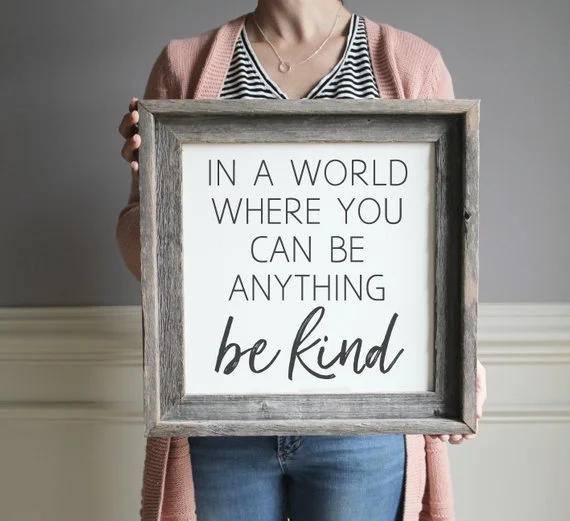 In a world farmhouse sign.jpg