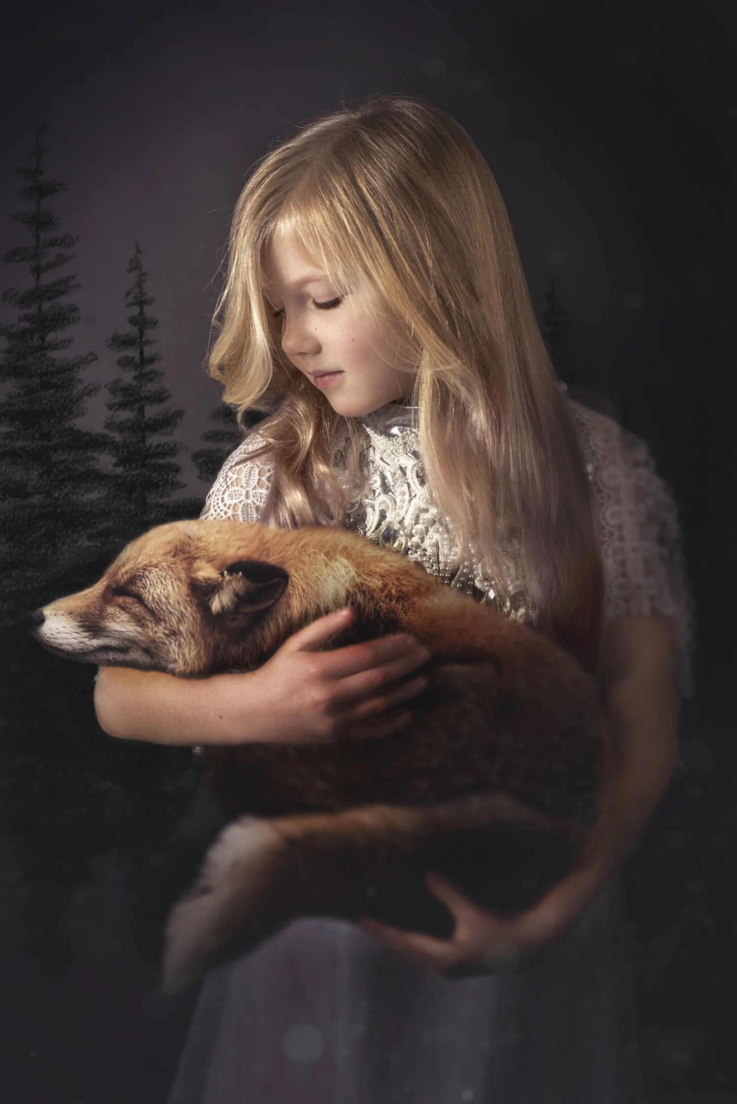 An imaginative portrait of a child holding a fox against a woodland backdrop