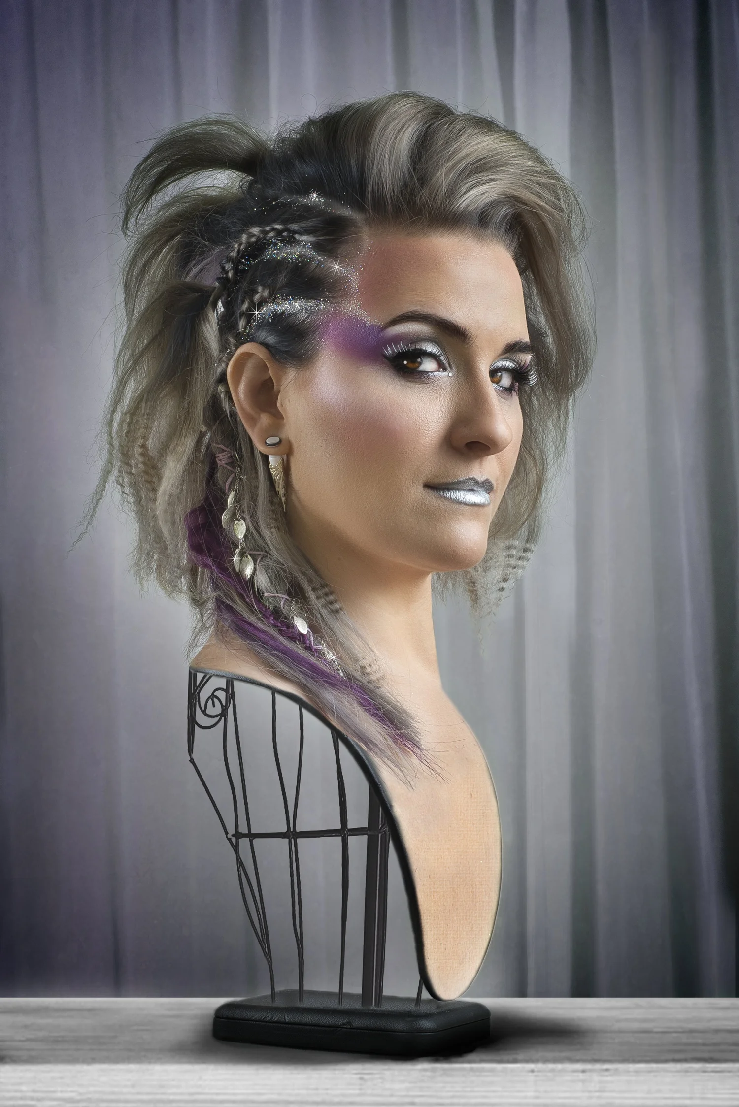 A surreal photographic portrait combining a face, mannequin form and birdcage