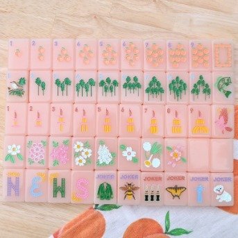 One lucky player will win tis adorable set of Peach &amp; Pine tiles at our Monday Mingle &amp; Mahjong event on Monday, March 23, 2026! Do you have your tickets yet?  Get them today, you may be the lucky winner!

Purchase your table at the following