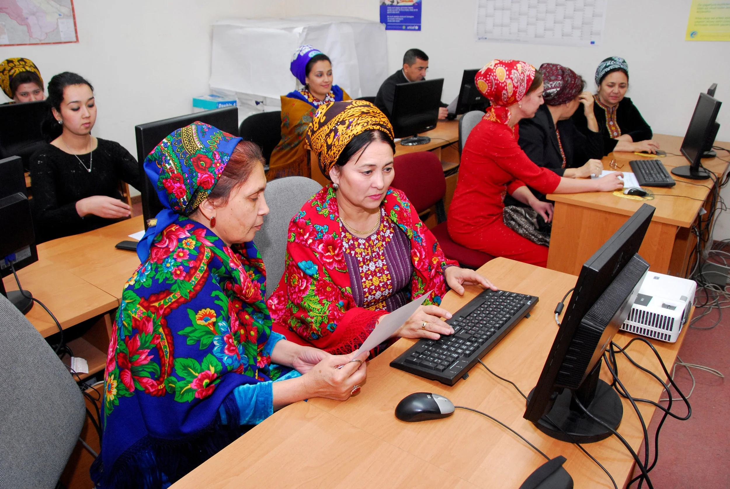 Statisticians entering data into the database for further processing and analysis. Source : World Bank via Flickr