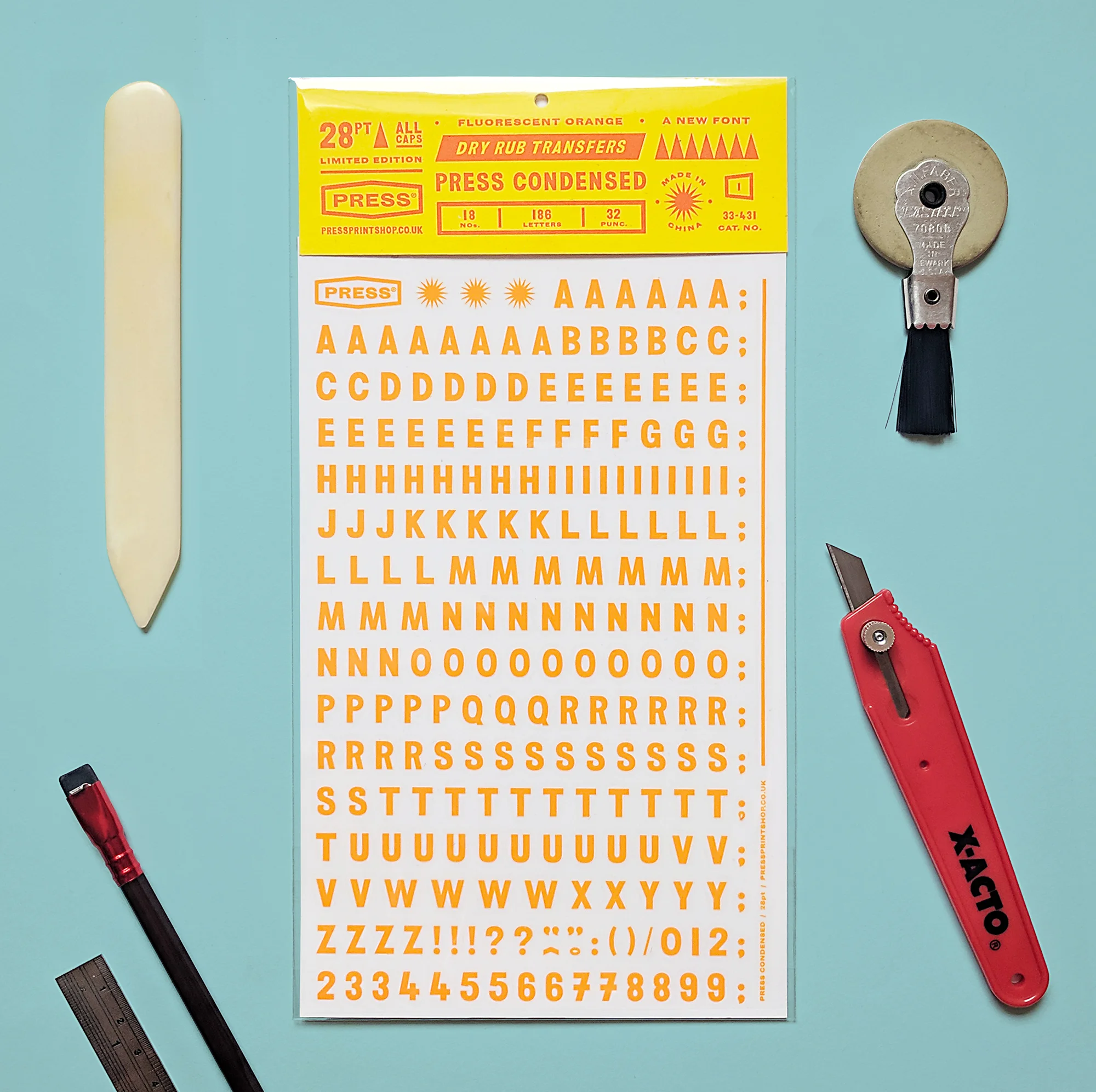 Press Condensed bright orange Dry Rub Transfer – available at pressprintshop.etsy.com