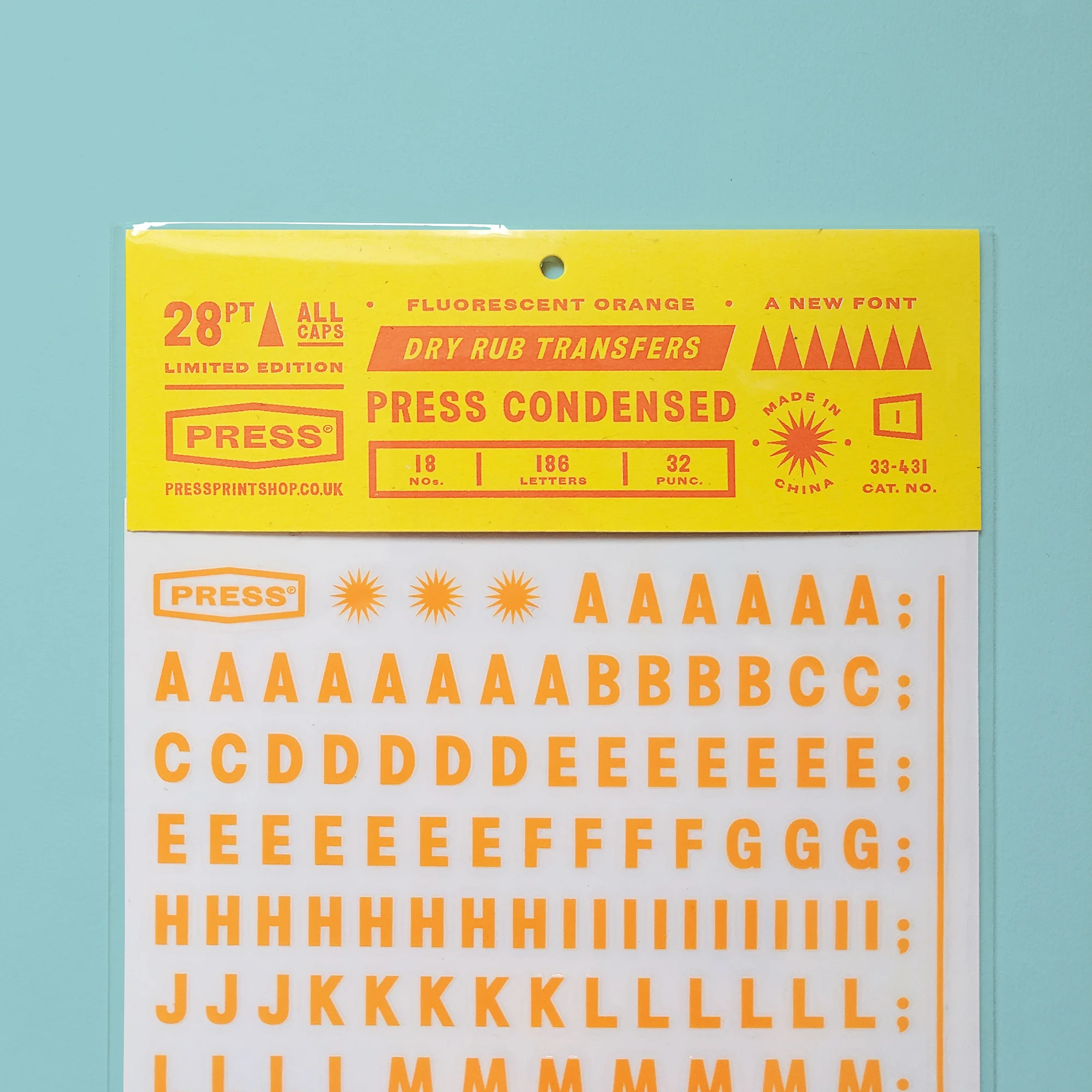 Press Condensed bright orange Dry Rub Transfer – limited edition