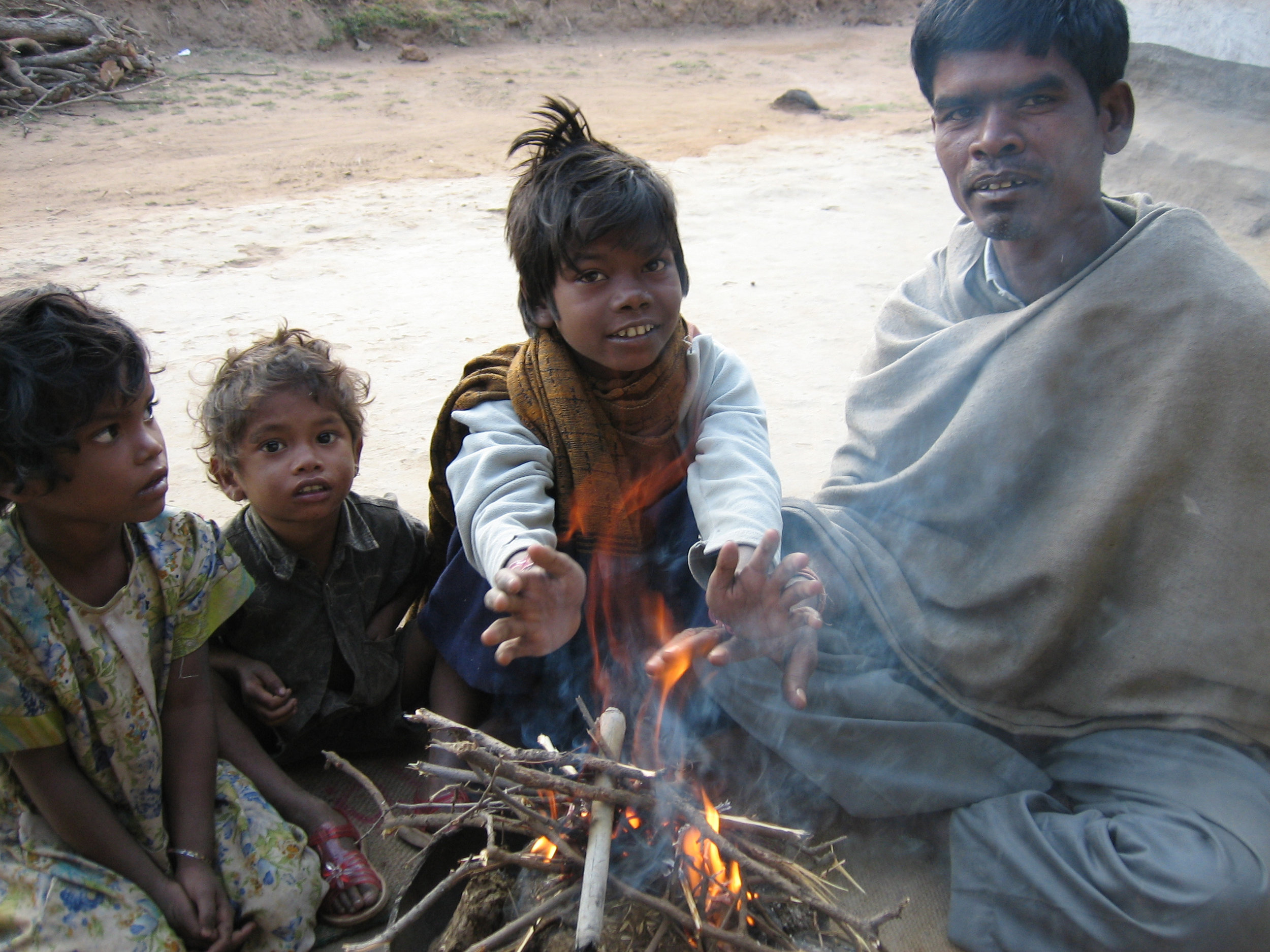 C17 Oraon Adivasis waking up.jpg