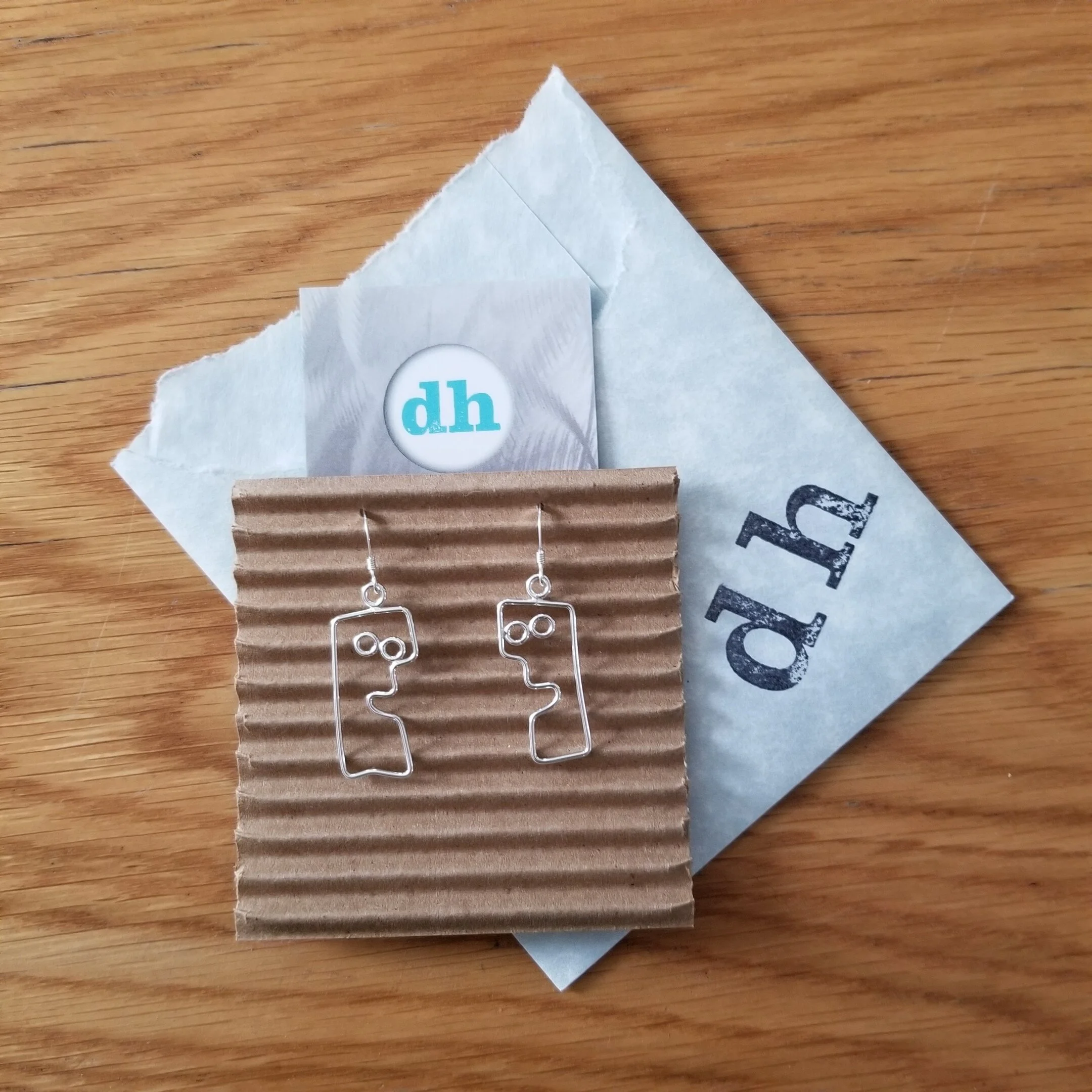 sterling silver face earrings