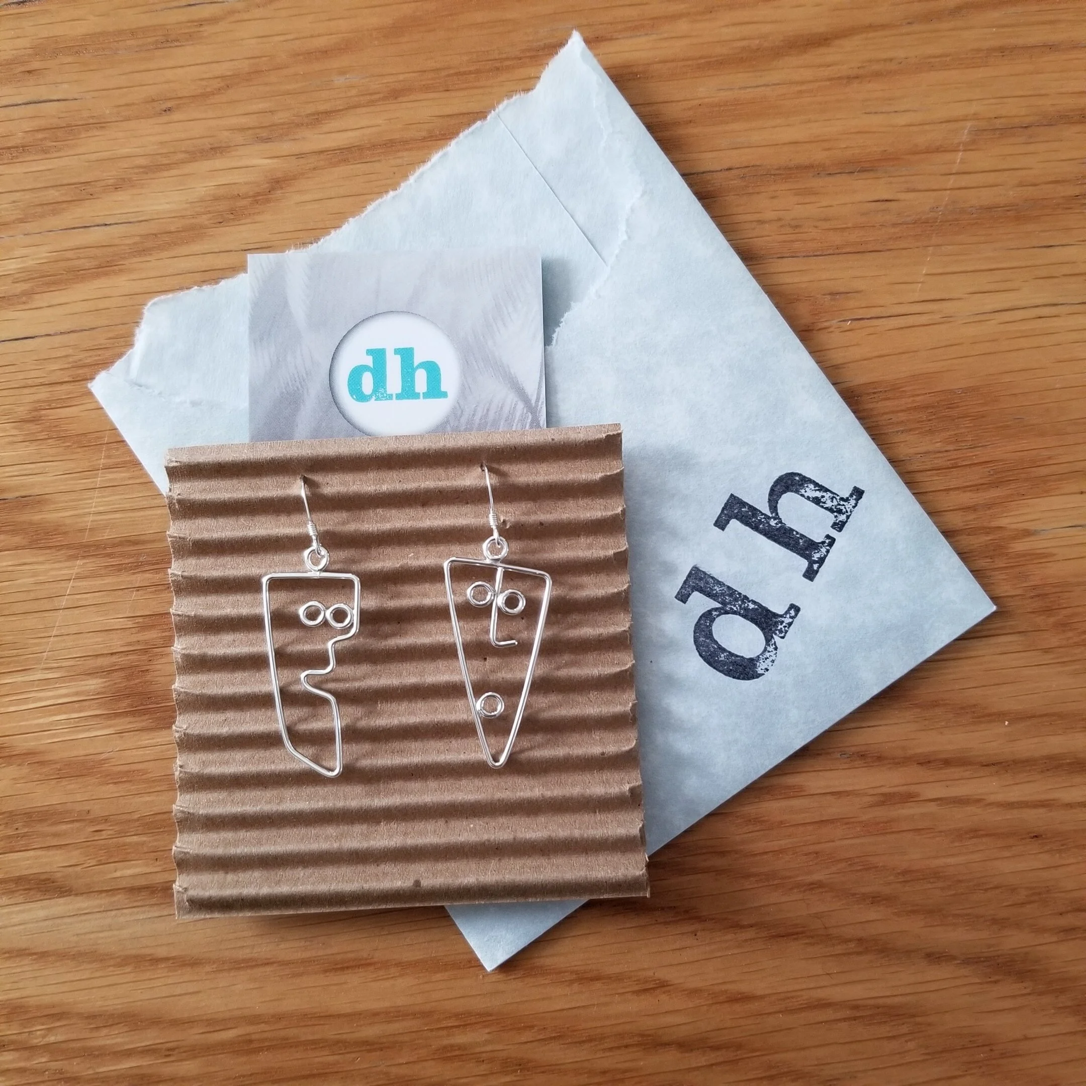 sterling silver face earrings