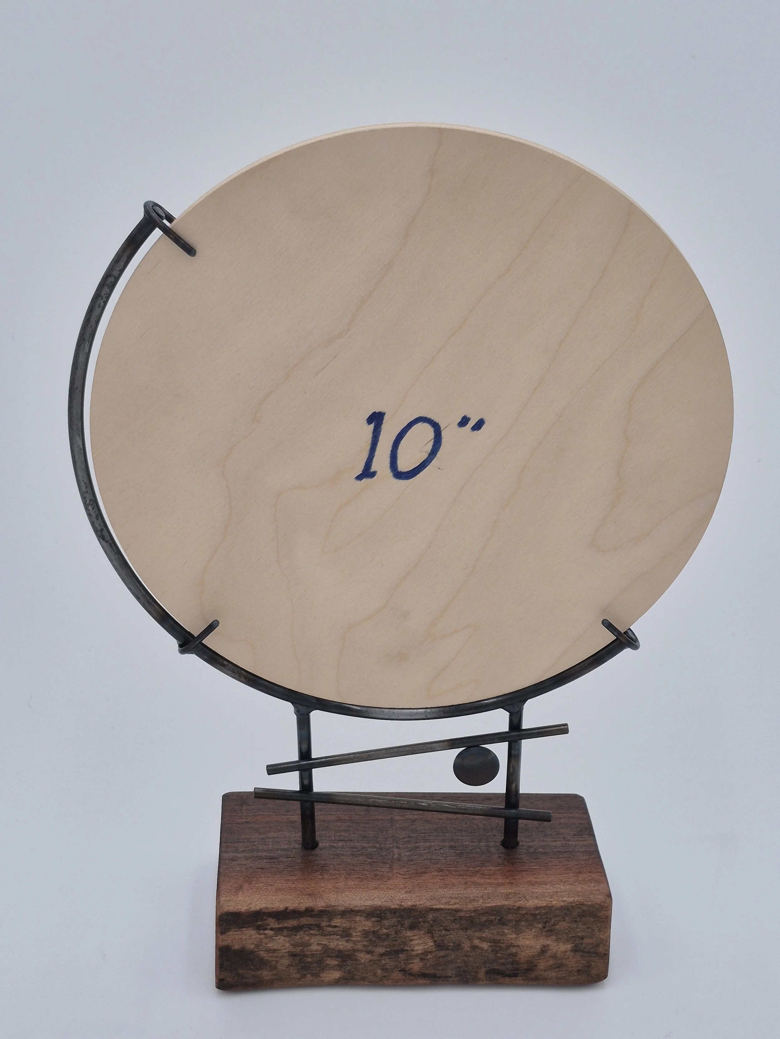 10" round glass frame on black walnut