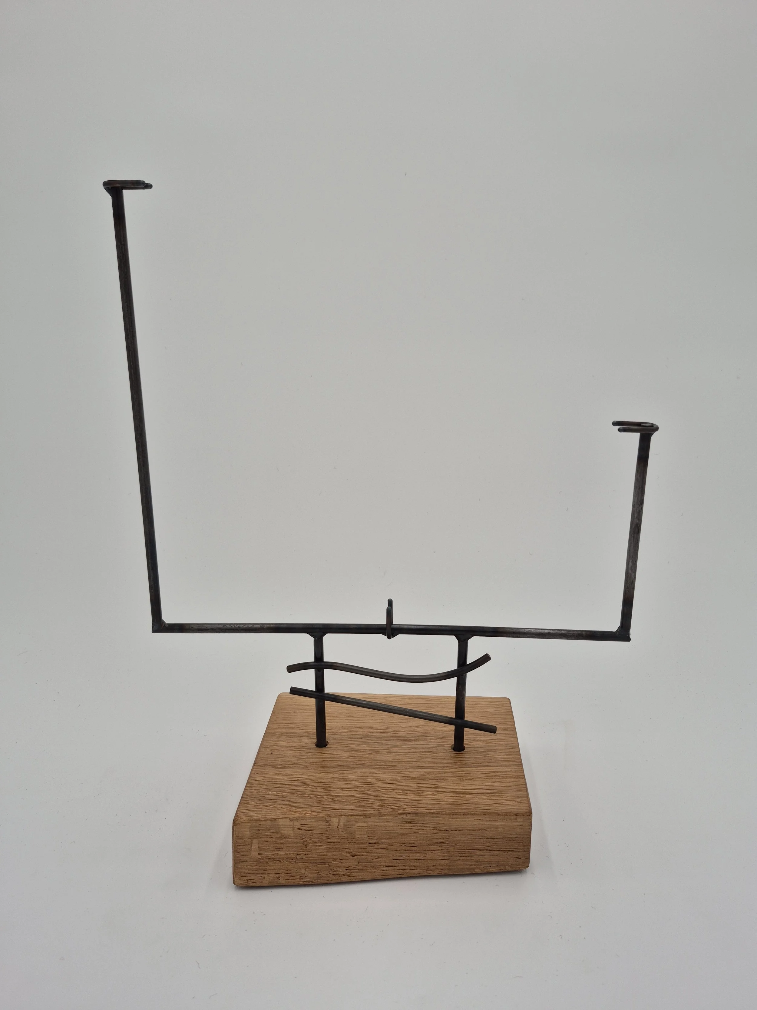 11" w x up to12" h glass stand on oak