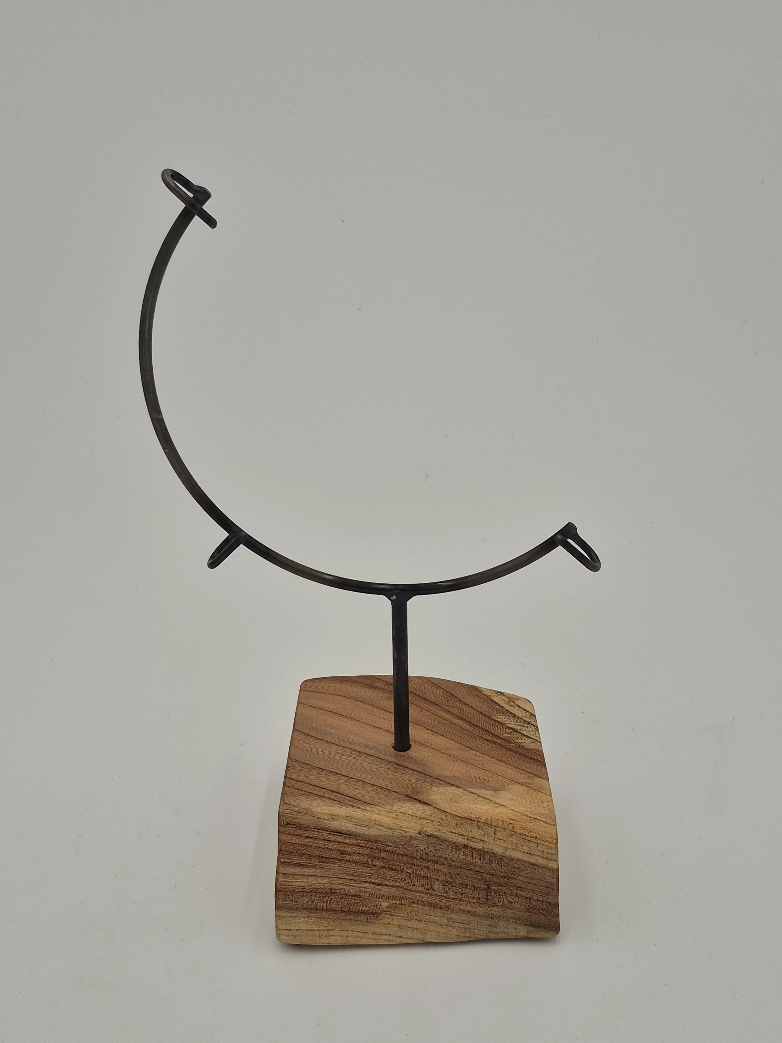8" round glass display stand on sycamore