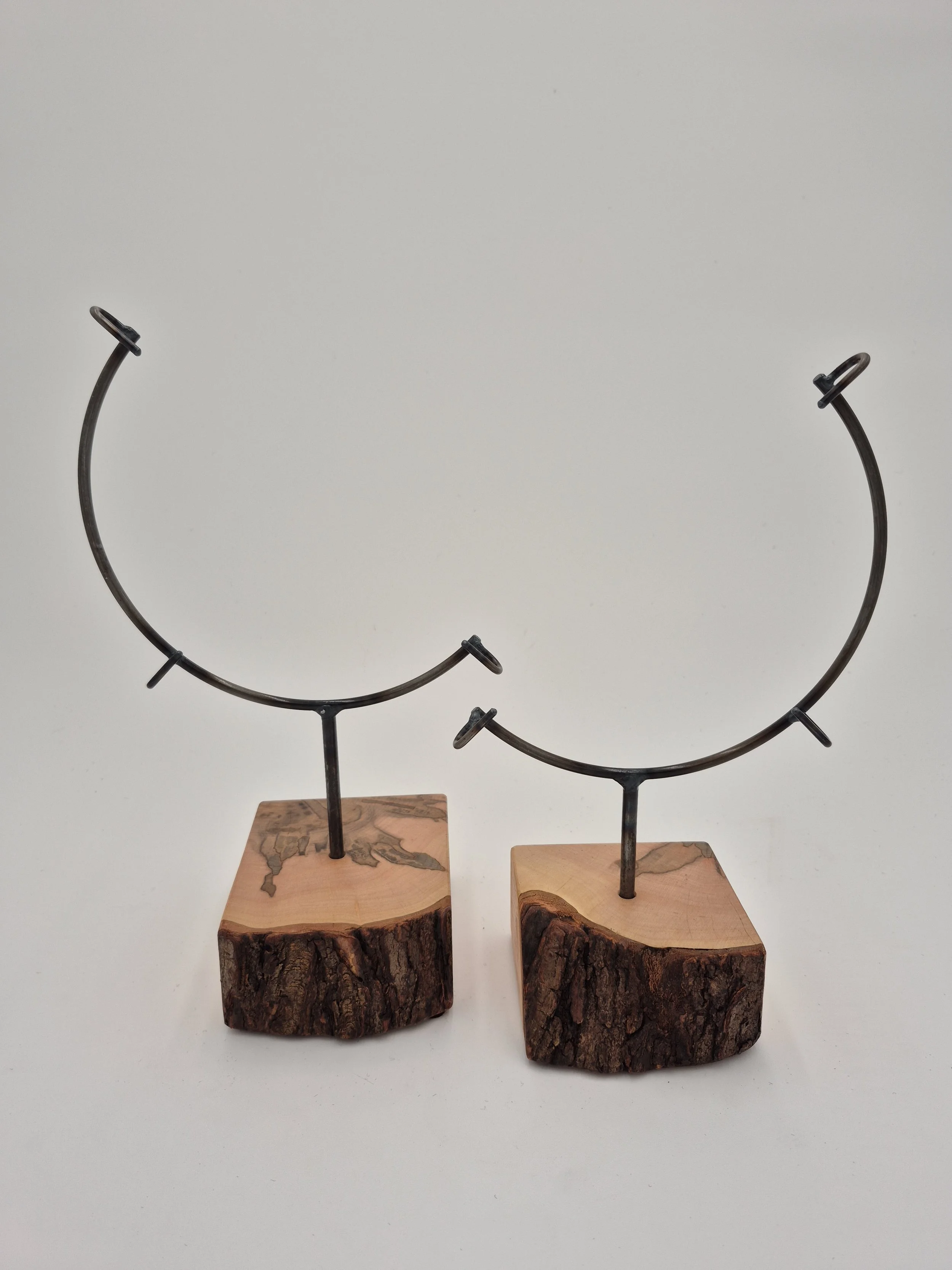 pair of 8" glass stands on ambrosia maple