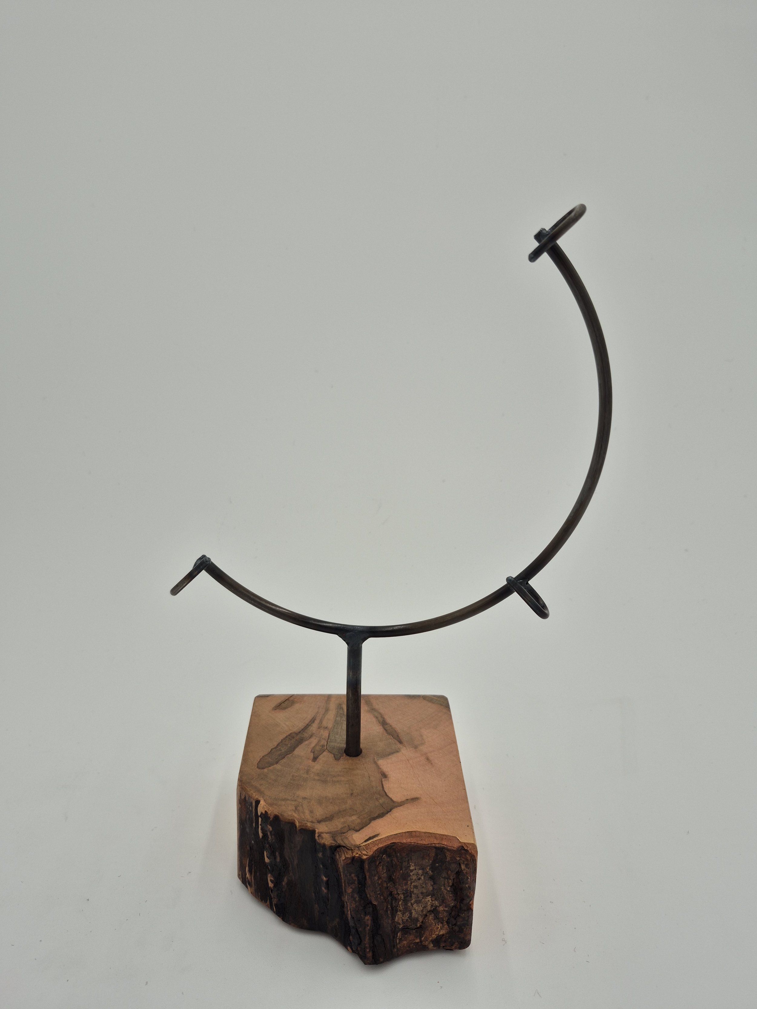 8" round glass stand on ambrosia maple