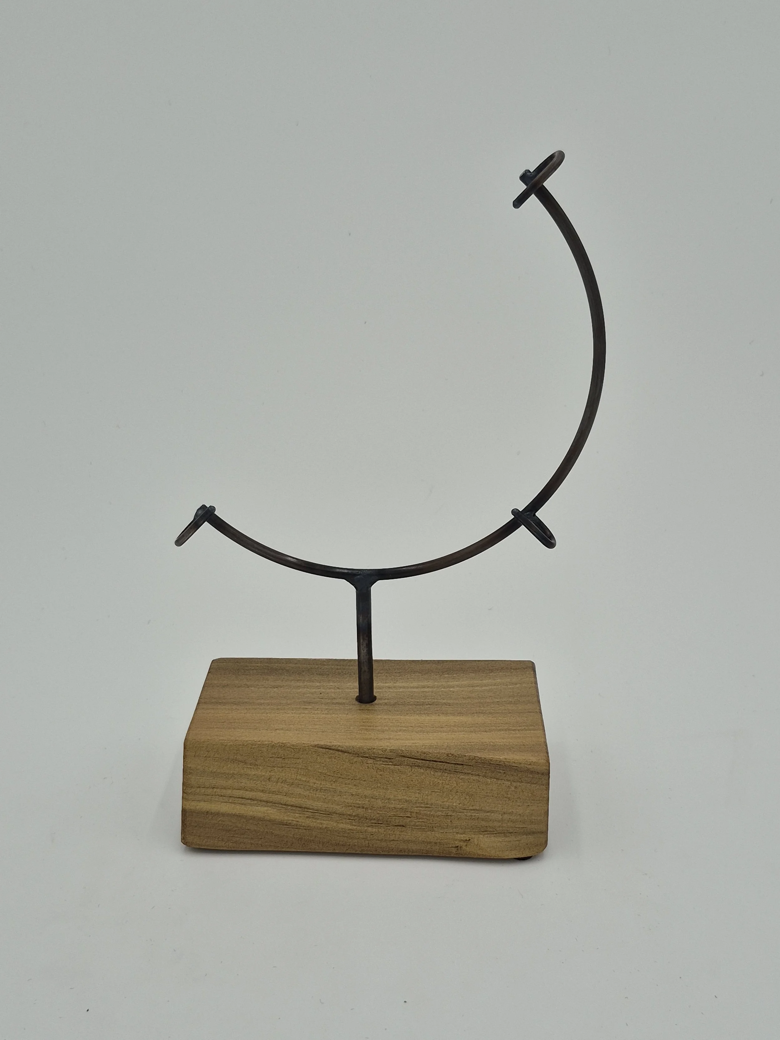 8" round glass stand on rainbow poplar