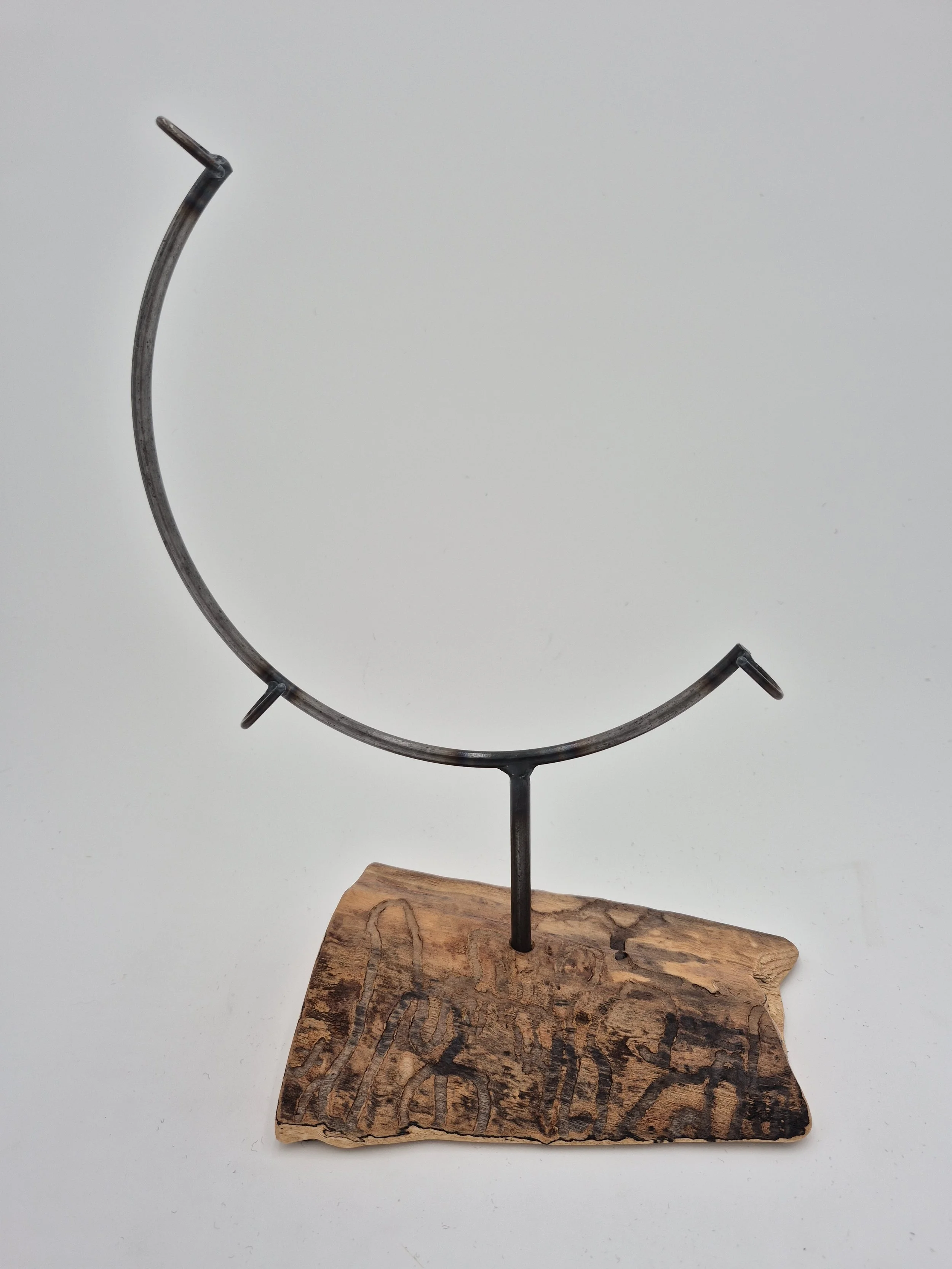 10" round glass frame on maple