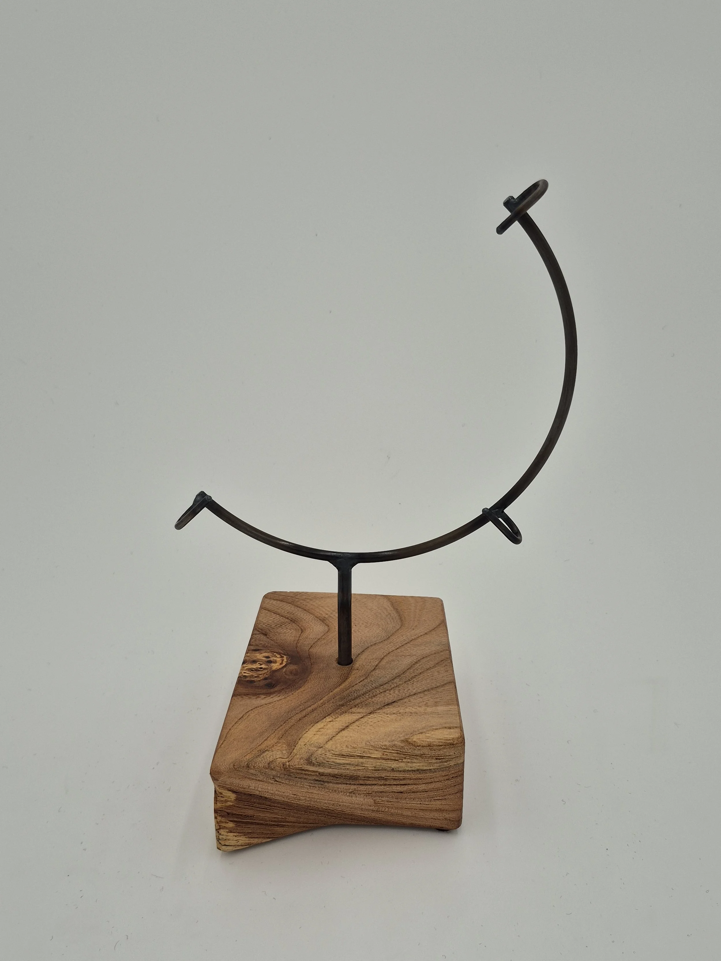 8" round glass stand on sycamore