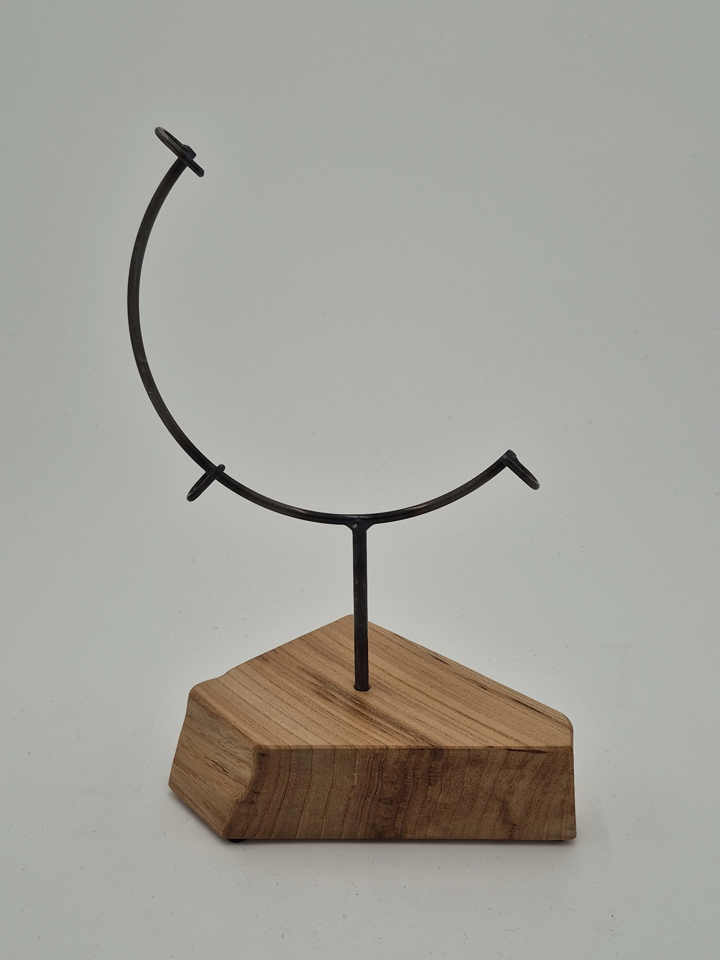 8" round glass stand on sycamore