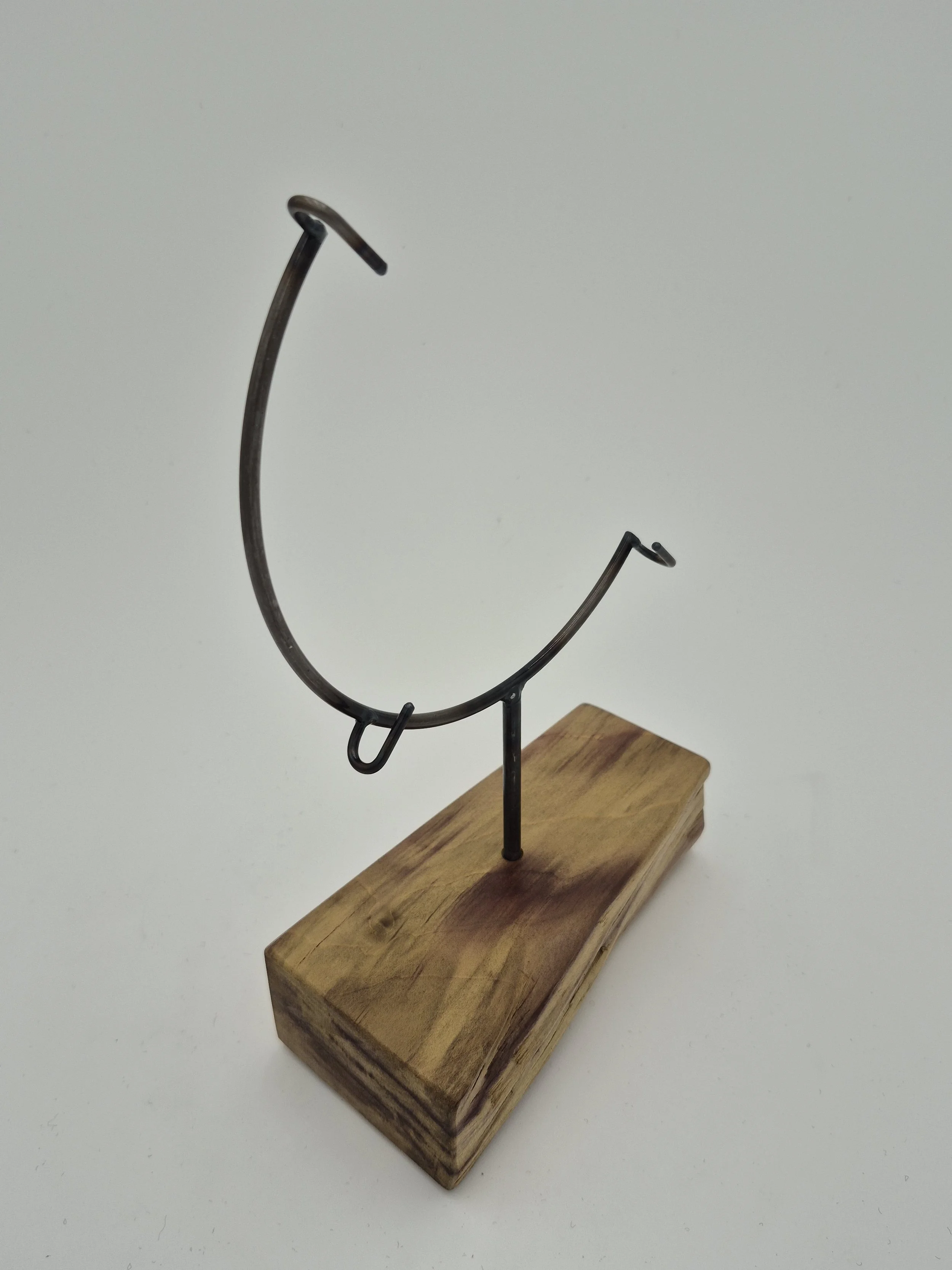 8" round glass stand on rainbow poplar