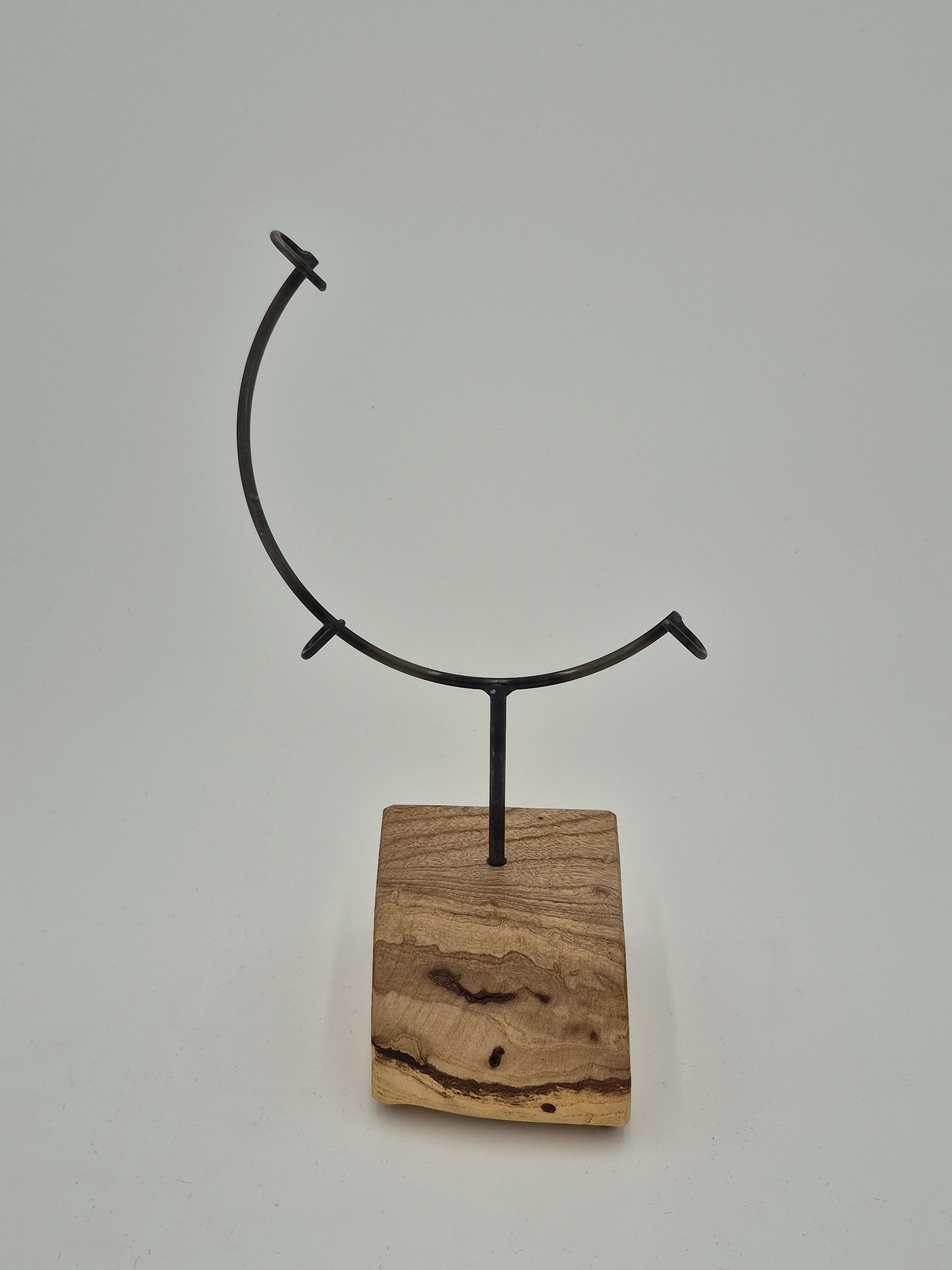8" round glass stand on maple