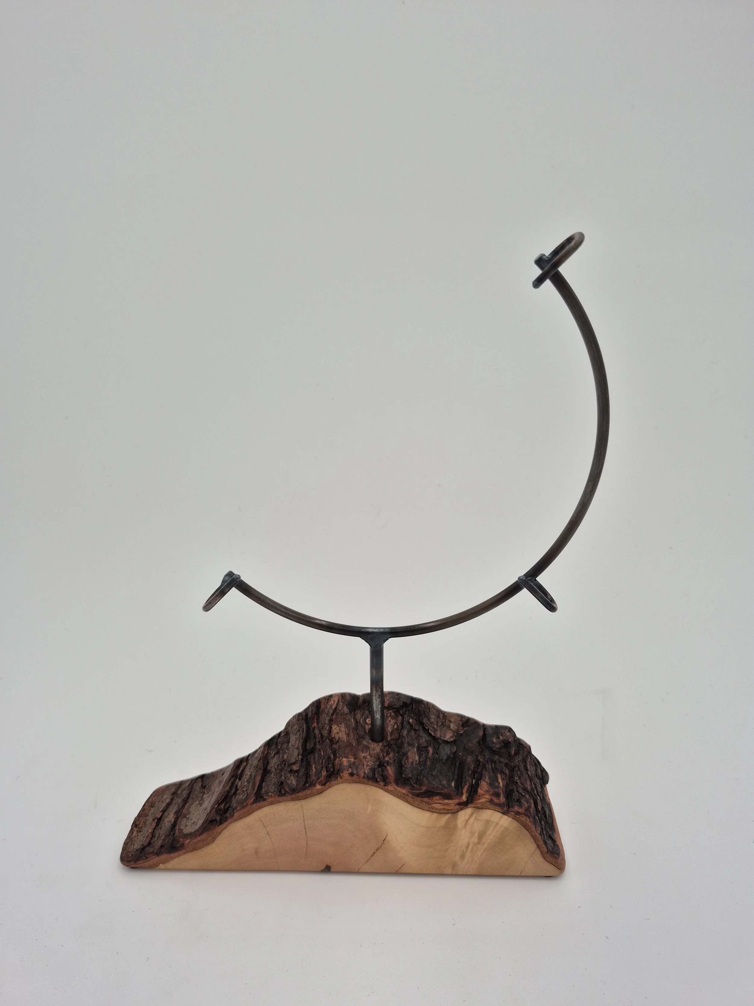 8" round glass stand on ambrosia maple