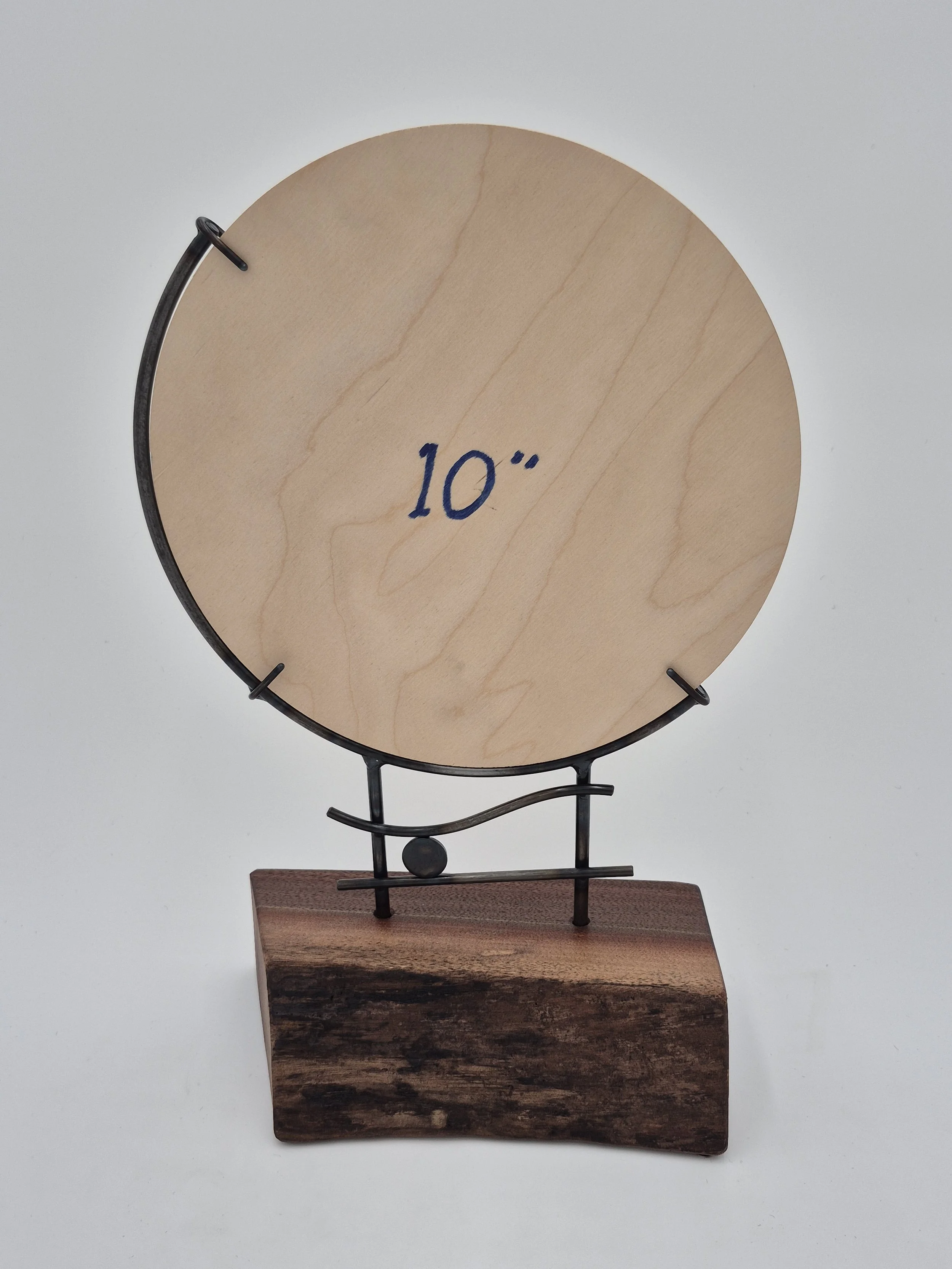 10" round glass stand on black walnut