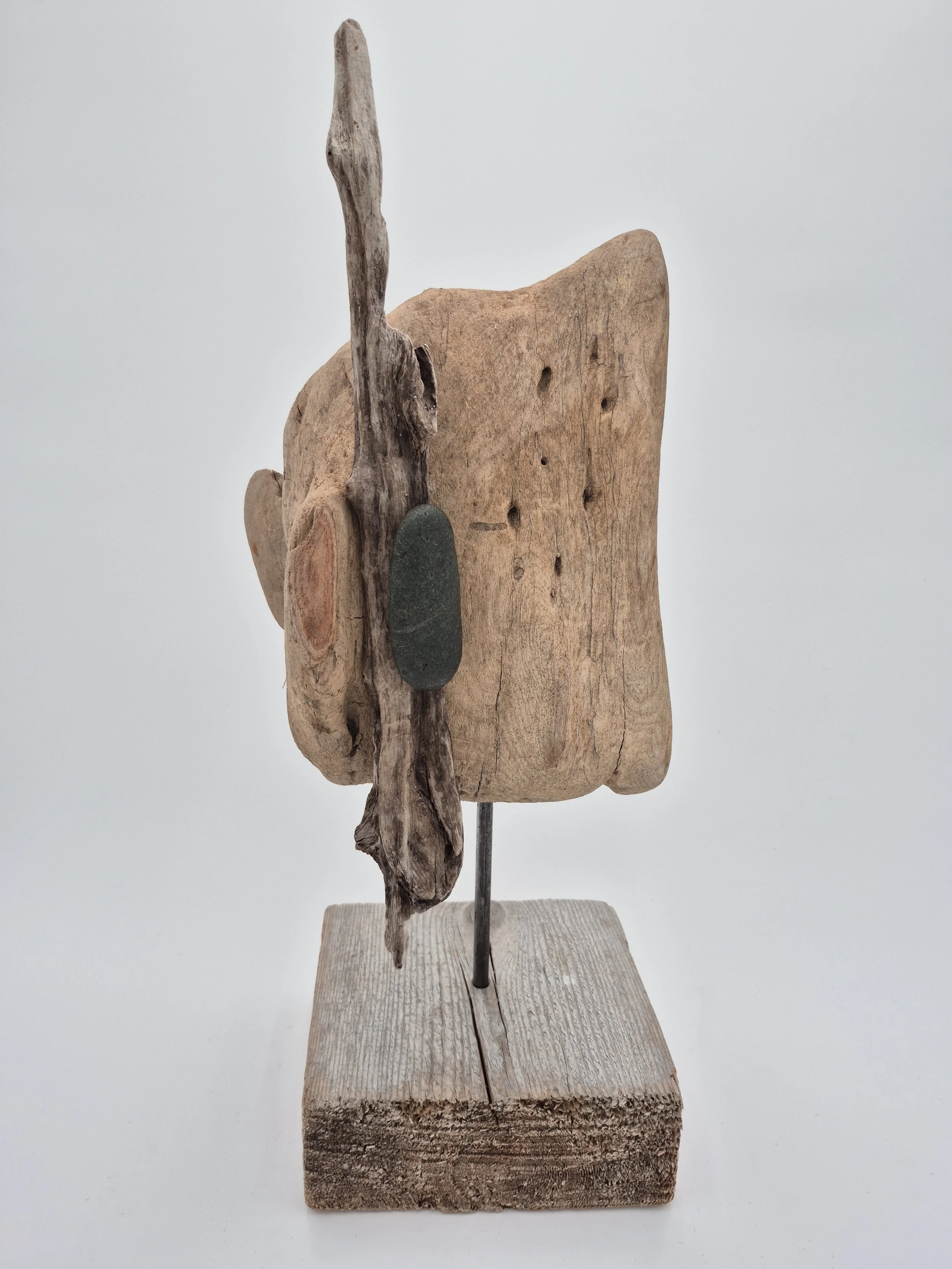 driftwood and stone sculpture