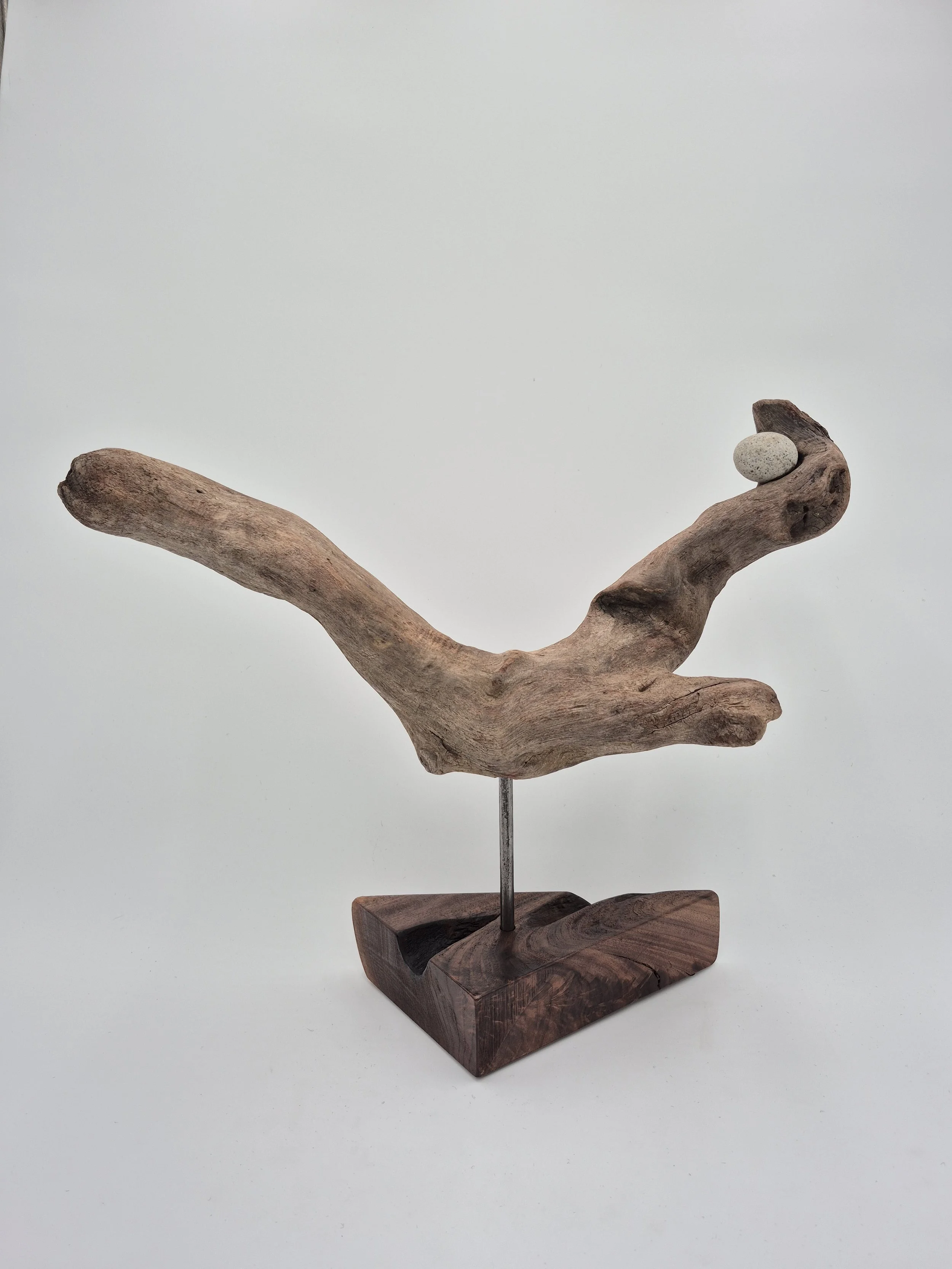 driftwood sculpture on live edge black walnut