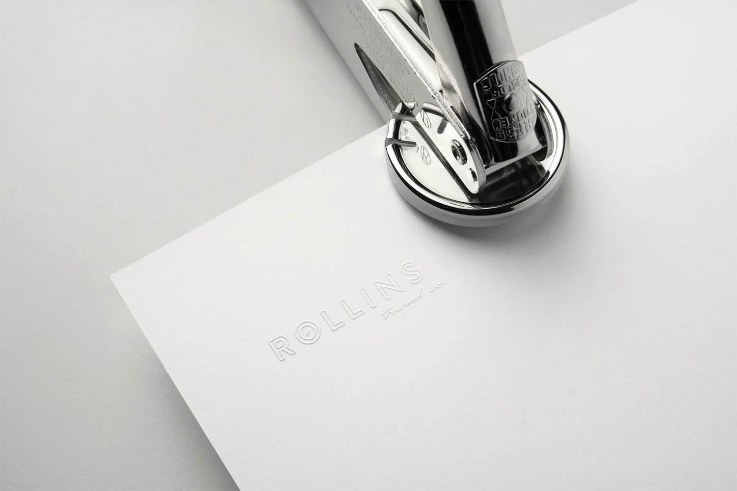 RollinsTravelCo_Logo_MockupEmbosser.jpg