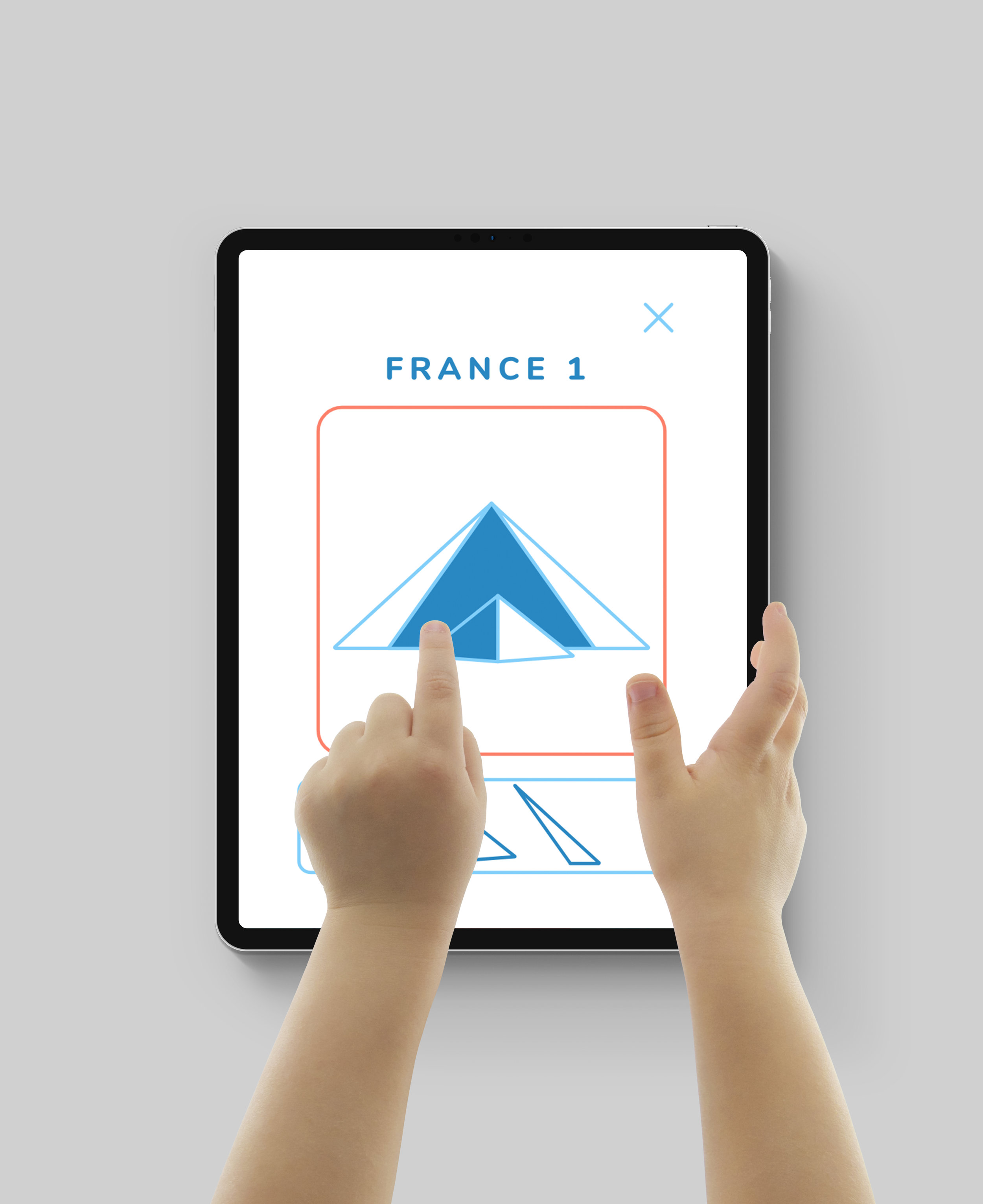 The monuments are abstracted to their main geometric shapes, and children drag shapes from the sliding menu bar at the bottom to fill their place in the puzzle to create the final image of the monument.