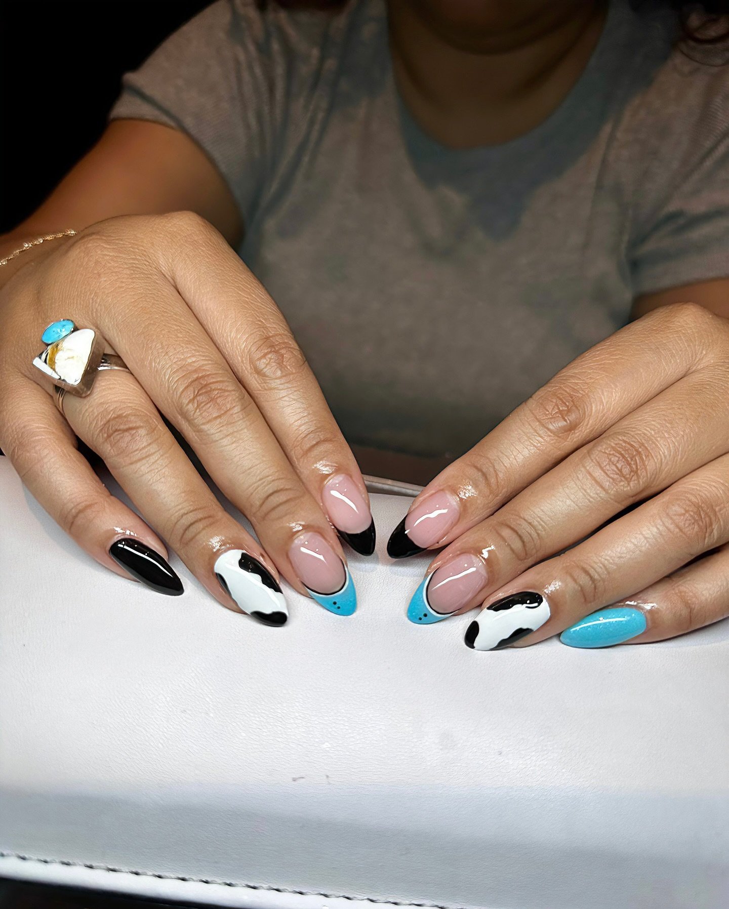 Udderly chic and utterly unique! 🐄💅 Ashley&rsquo;s multi-layer French tip with cow patterns is moo-ving the nail game to a whole new level. Dare to be different at Bliss Nails &amp; Spa. 

#NailArt #CowPrintChic #FrenchTipFun #blissandspa #stationl