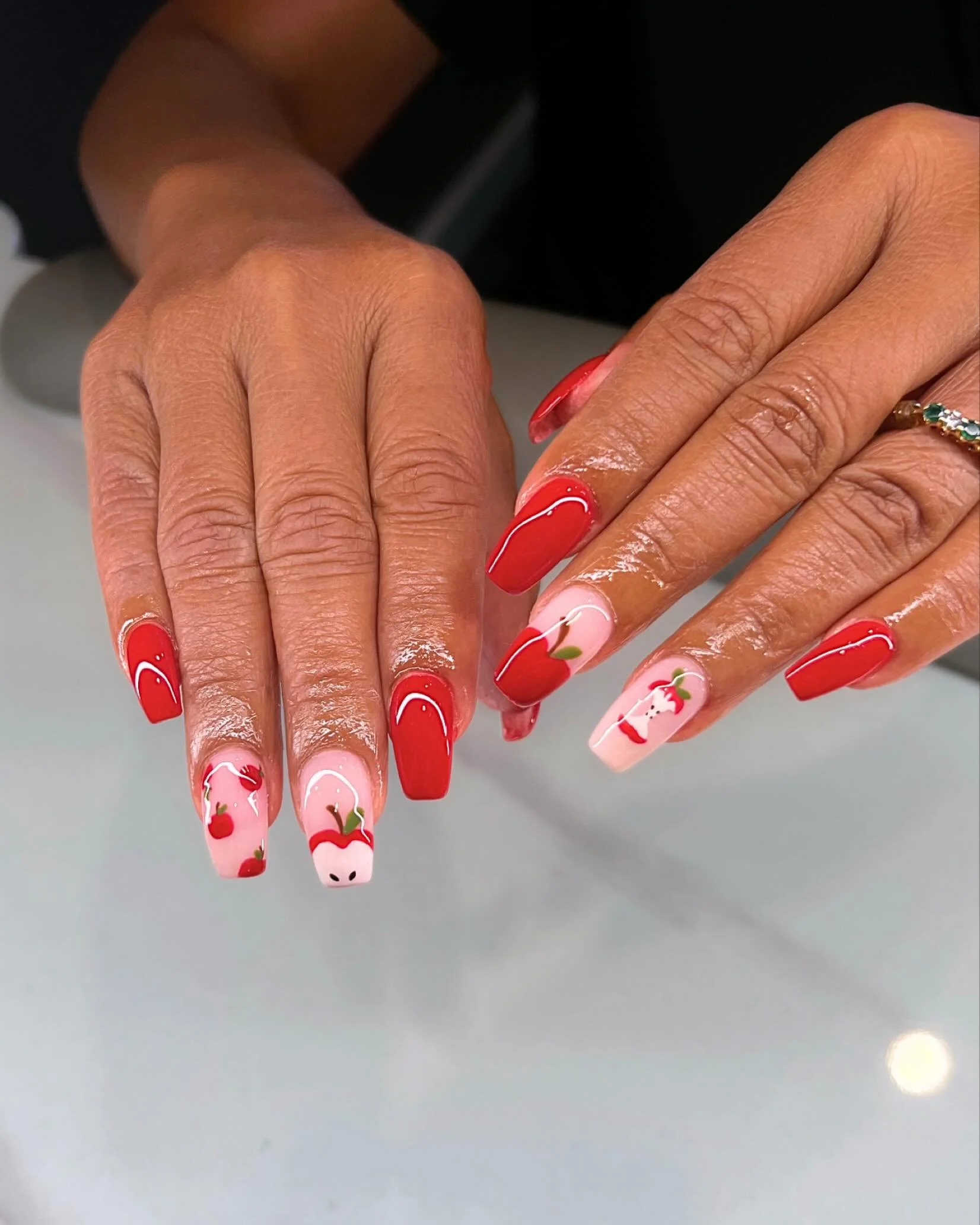 🍎 Big Apple Red with a Twist 🍎
When classic meets creativity 💅 Dylan took OPI&rsquo;s iconic Big Apple Red and gave it a playful spin with hand-painted apple art 🍏🍎. Bold, fresh, and perfect for making a statement this Fall.

✨ From timeless red