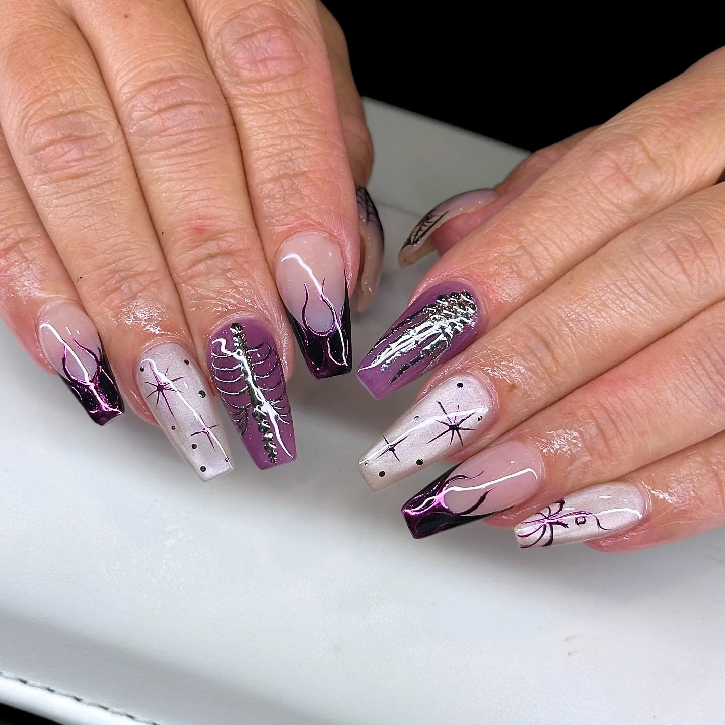 💜🕸️ Witch vibes, but make it glam.
Ashley snapped with this Halloween set &mdash; chrome ribs, spiderweb details, and that perfect mix of purple + black for spooky season 🔮

It&rsquo;s giving witch energy, but still wearable for everyday October s