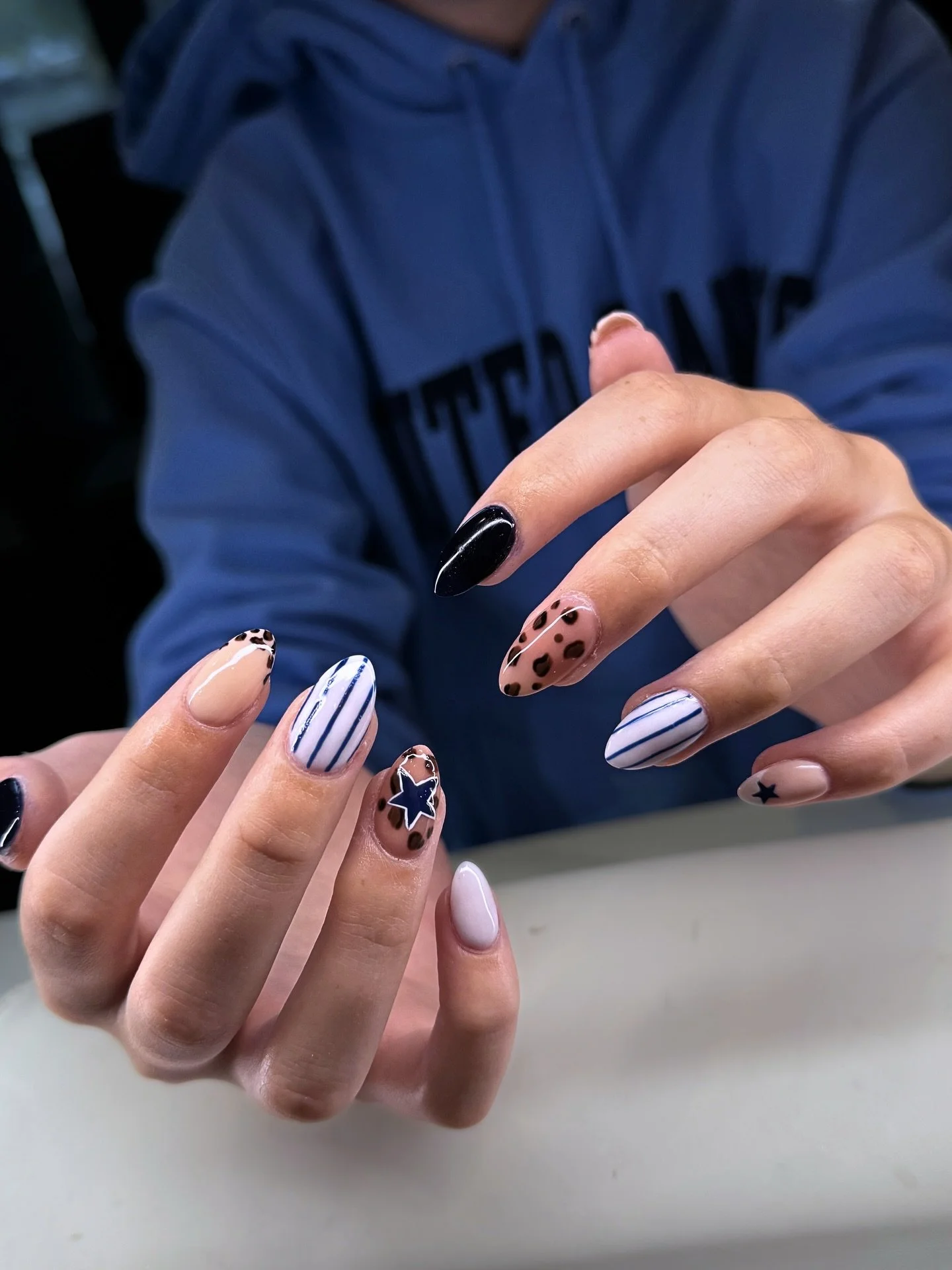 ✨Nail game = UNMATCHED.✨ Nhi&rsquo;s set this week is a whole mood 💅 From edgy leopard spots to chic pinstripes + bold navy stars, every detail was hand-painted by our nail art queen, Saly 🎨

👉 Tag your bestie who&rsquo;d rock this vibe
📍Boston |