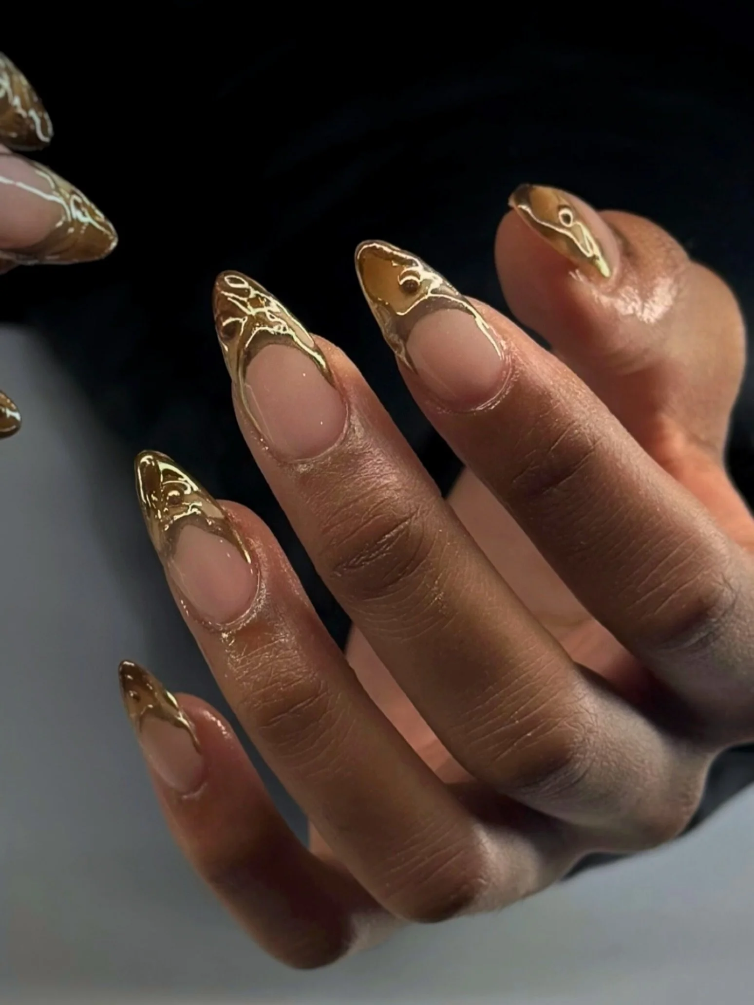 Gold. Gloss. Glam. ✨
This week&rsquo;s set by Saly is all about luxury&mdash;featuring bold 3D gold chrome French tips over a clean nude base. Minimal, sculptural, and seriously extra in the best way 💅🏾💫

If you&rsquo;re in Boston, Medford, Somerv