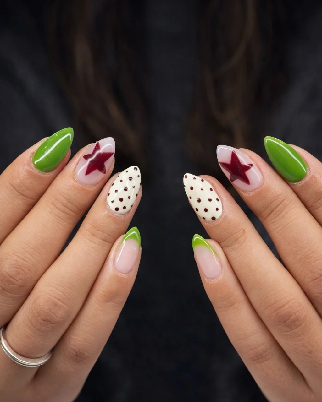 Proof that nail art doesn&rsquo;t have to be serious to be seriously good 💅💚

Nhi&rsquo;s latest set mixes playful retro dots, bold red stars, abstract greens, and a fresh twist on French tips&mdash;because your nails should be as fun as your vibe.