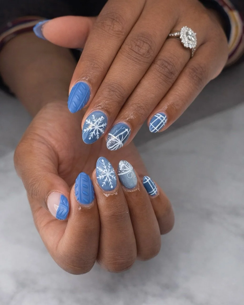 When your nails match the weather &mdash; but make it ✨chic✨
This blizzard weekend calls for cozy layers and icy blue nail art ❄️💅 Nhi&rsquo;s latest design mixes sweater texture, snowflake detailing, and subtle shimmer for a look that feels like wi