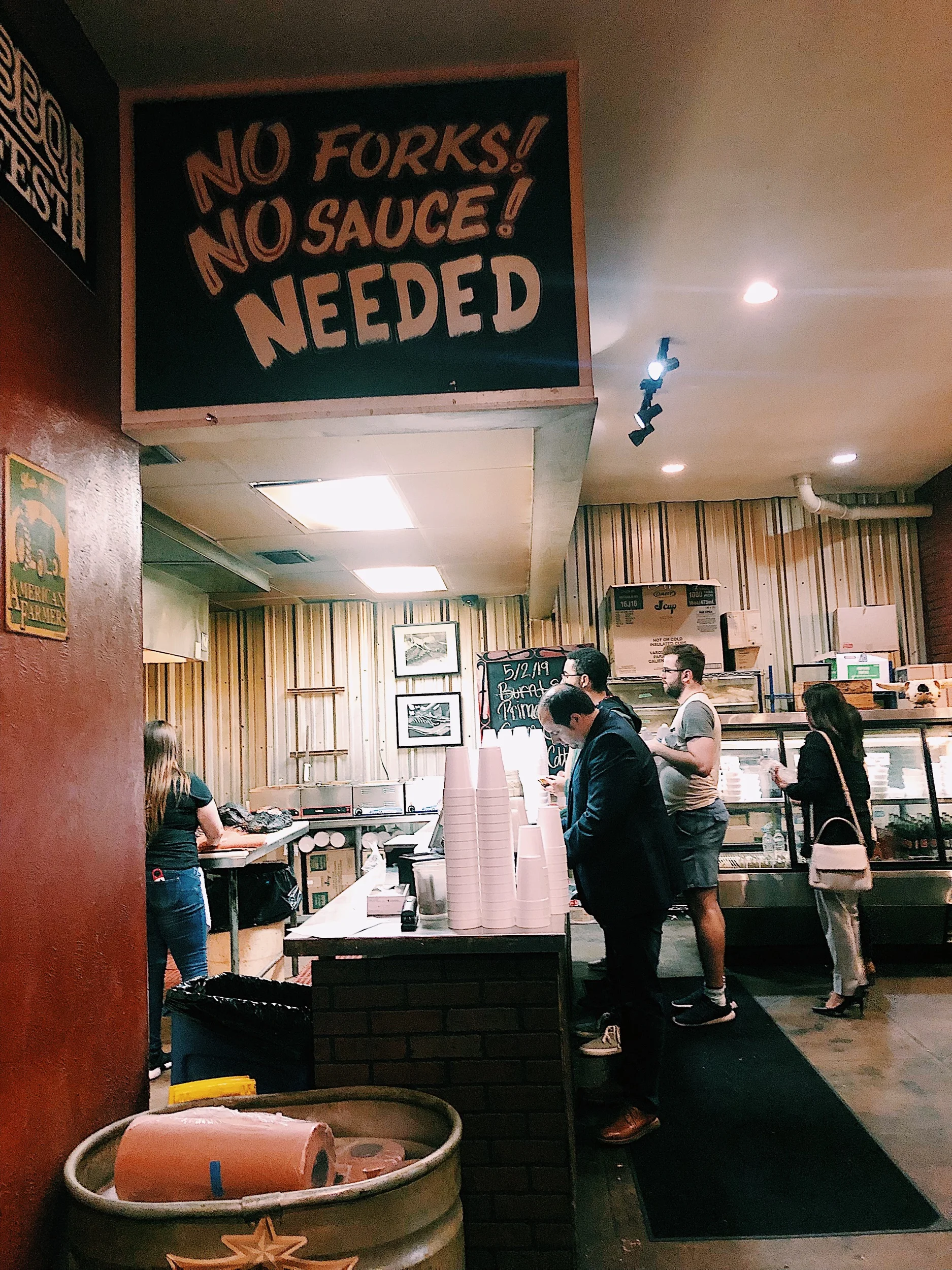 Although the sign says “no sauce needed”, their BBQ sauce is straight fire!
