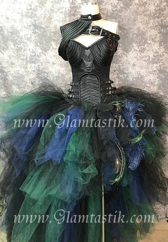 peacock feather corset dress Mod Menagerie: 4/6 details: this sheer organza corset is a structural beauty- with dramatic hip juts and a elegant peacock feather skirt- each feather hand placed and styled into place, adding up