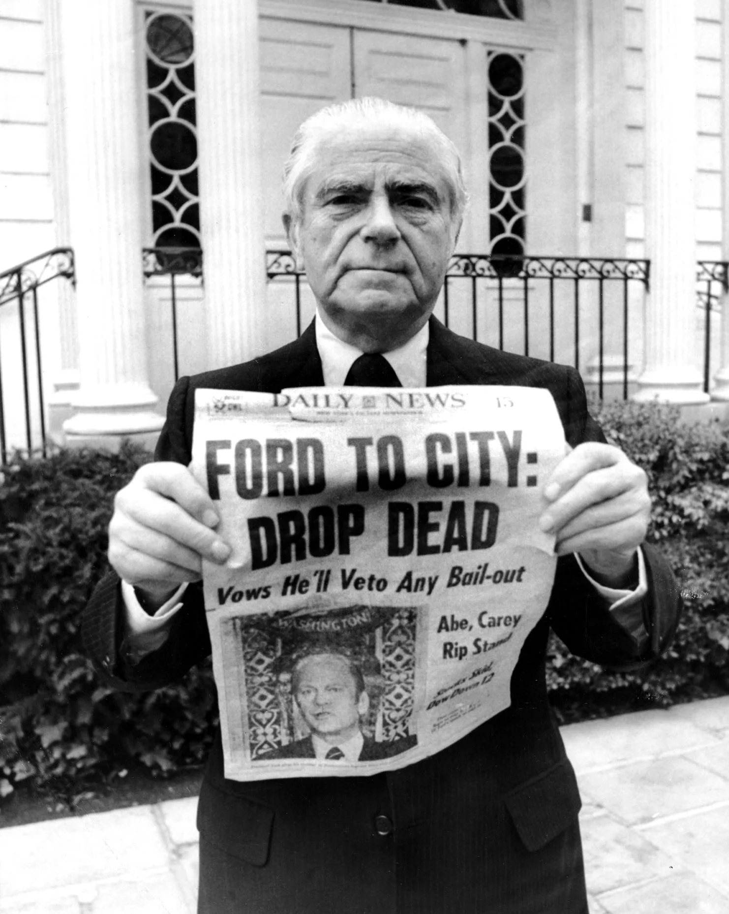 In 1975, New York City was at the brink of financial collapse. President Gerald Ford gave a speech saying that he would oppose any federal assistance to help save the City. “Ford to City: Drop Dead” was the famous headline that ran on October 30th, 1975 in the New York Daily News, as shown here held by Abraham Beame, Mayor of New York City from 1974-1977. Credit: Getty Images